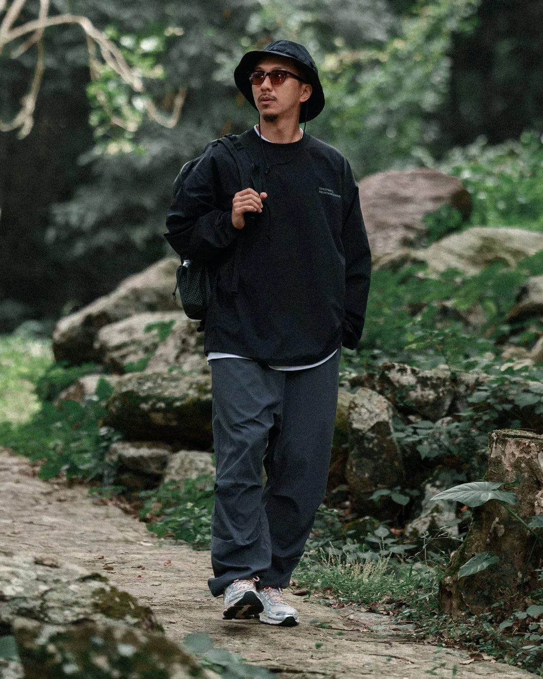 A Eckhaus Latta Shirt pictured on a model in front of a white background. The title of the product is Eckhaus Latta Eclipse Turtleneck - Stone and the image was taken by 199A®.