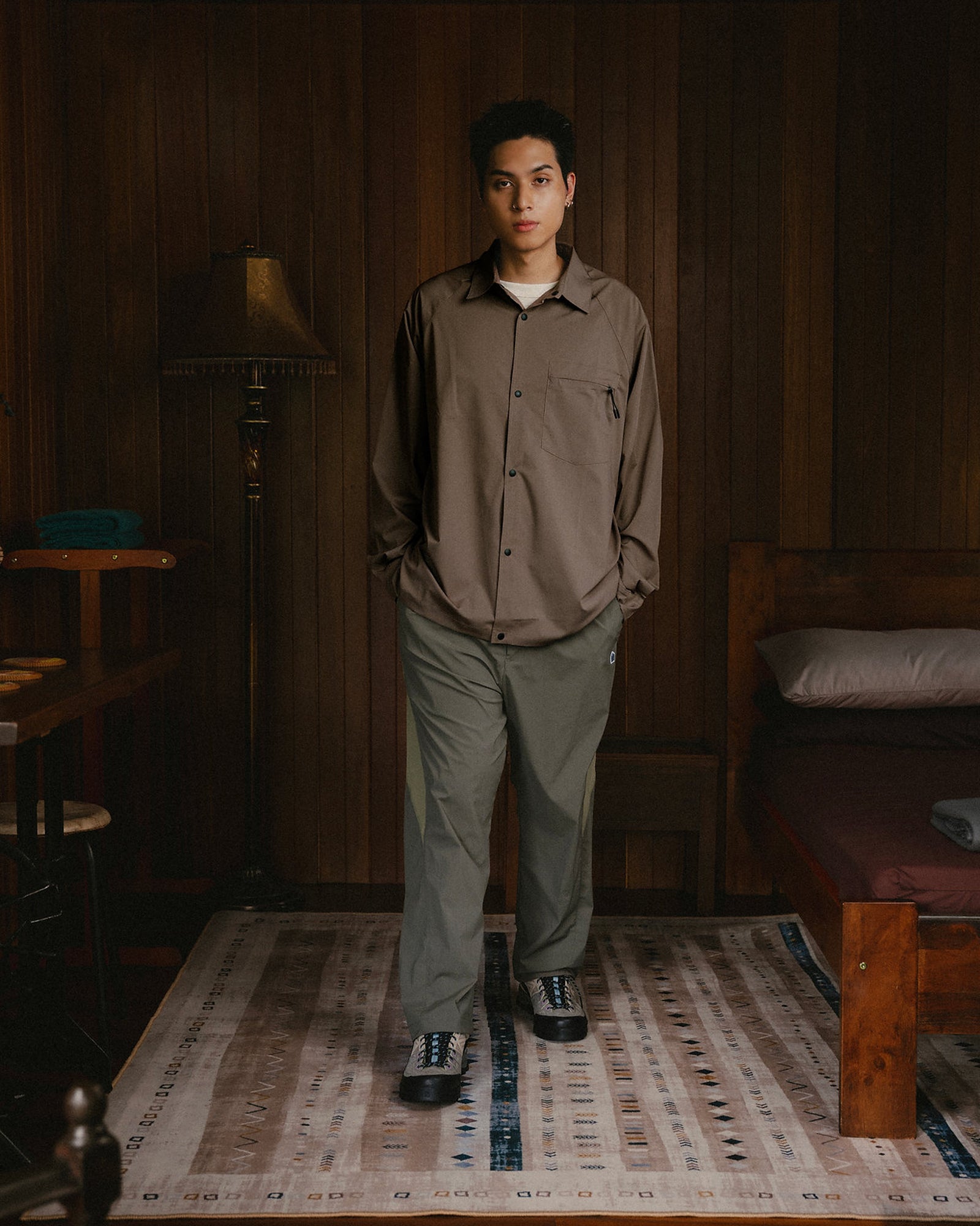 A Eckhaus Latta Shirt pictured on a model in front of a white background. The title of the product is Eckhaus Latta Eclipse Turtleneck - Stone and the image was taken by 199A®.