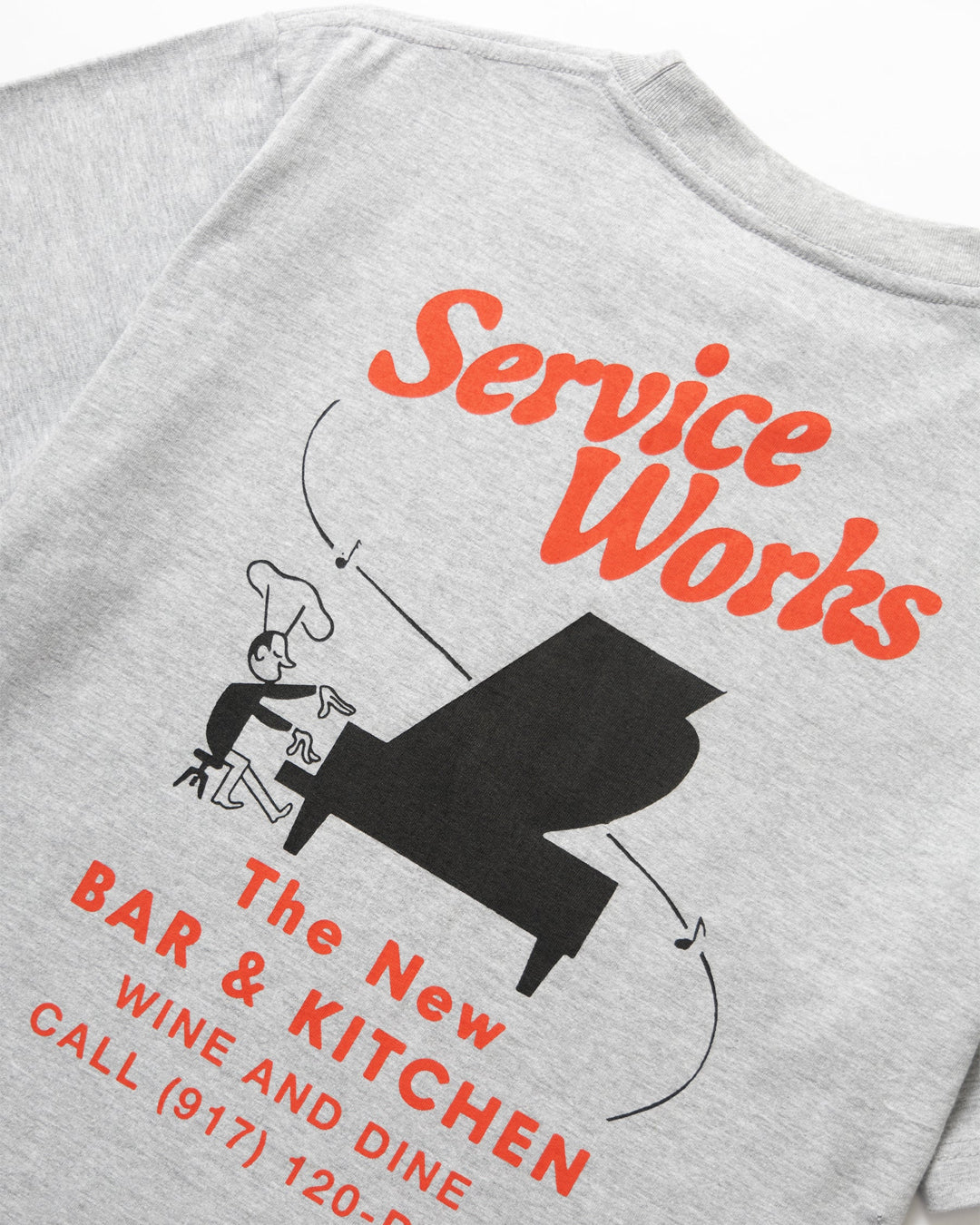 A Eckhaus Latta Shirt pictured on a model in front of a white background. The title of the product is Eckhaus Latta Eclipse Turtleneck - Stone and the image was taken by 199A®.