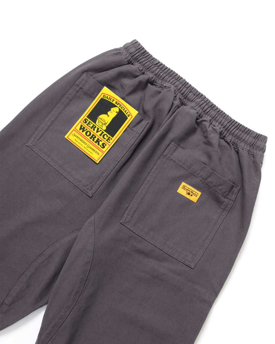 A Eckhaus Latta Shirt pictured on a model in front of a white background. The title of the product is Eckhaus Latta Eclipse Turtleneck - Stone and the image was taken by 199A®.