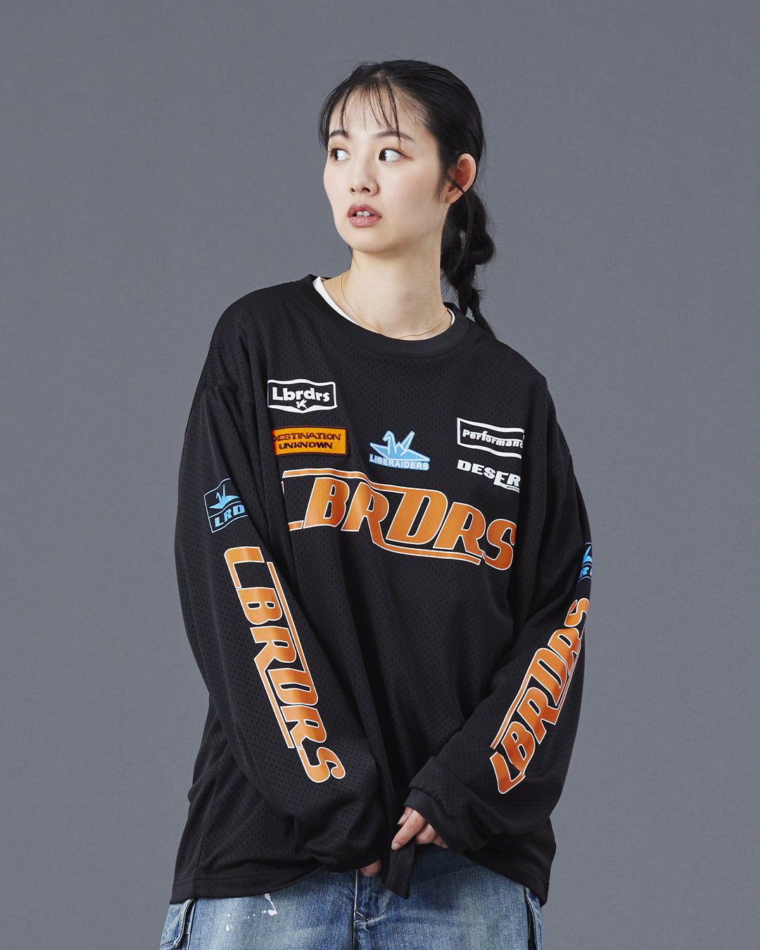 A Eckhaus Latta Shirt pictured on a model in front of a white background. The title of the product is Eckhaus Latta Eclipse Turtleneck - Stone and the image was taken by 199A®.