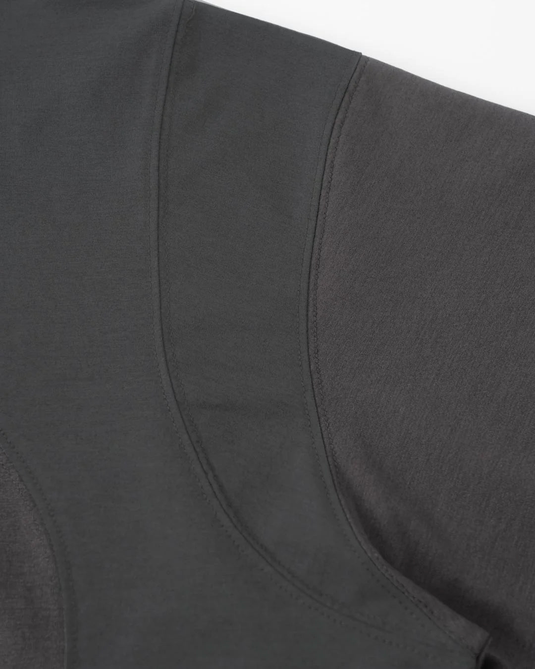 A Eckhaus Latta Shirt pictured on a model in front of a white background. The title of the product is Eckhaus Latta Eclipse Turtleneck - Stone and the image was taken by 199A®.