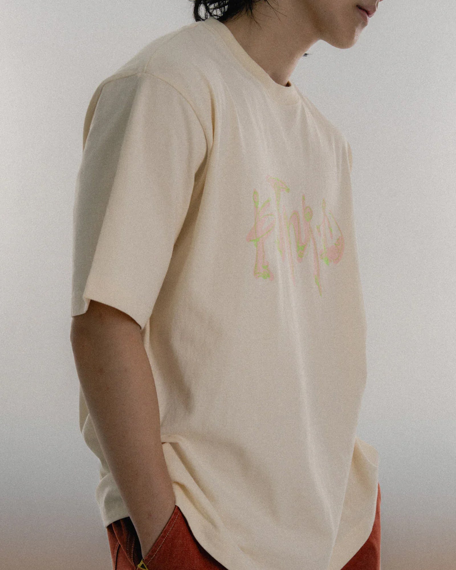 A Eckhaus Latta Shirt pictured on a model in front of a white background. The title of the product is Eckhaus Latta Eclipse Turtleneck - Stone and the image was taken by 199A®.