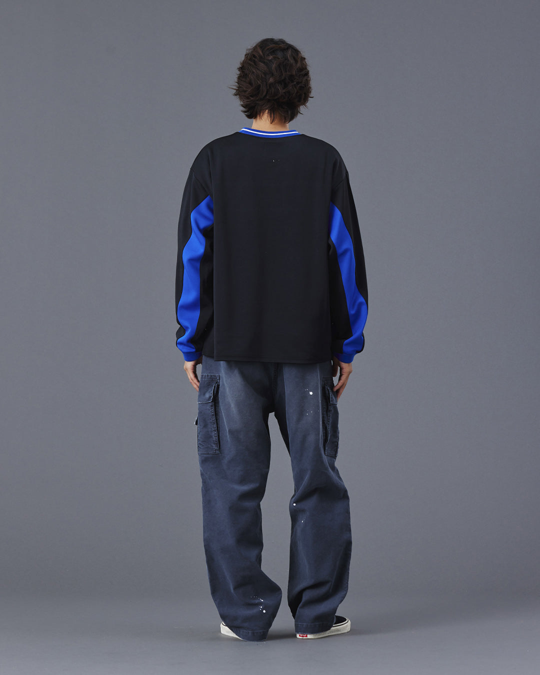 A Eckhaus Latta Shirt pictured on a model in front of a white background. The title of the product is Eckhaus Latta Eclipse Turtleneck - Stone and the image was taken by 199A®.