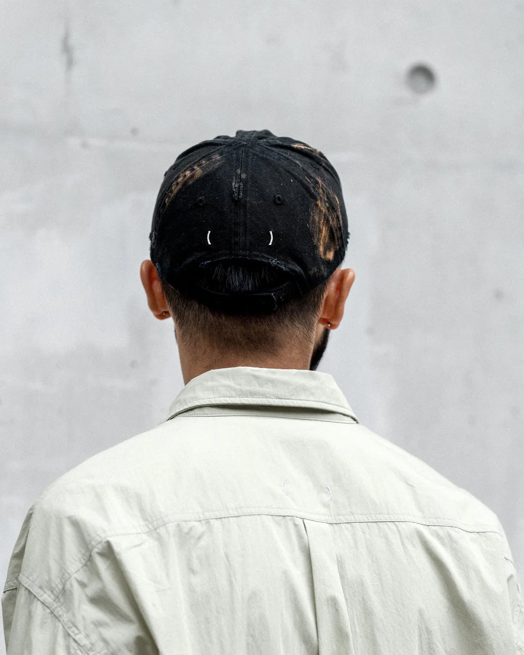 A Eckhaus Latta Shirt pictured on a model in front of a white background. The title of the product is Eckhaus Latta Eclipse Turtleneck - Stone and the image was taken by 199A®.