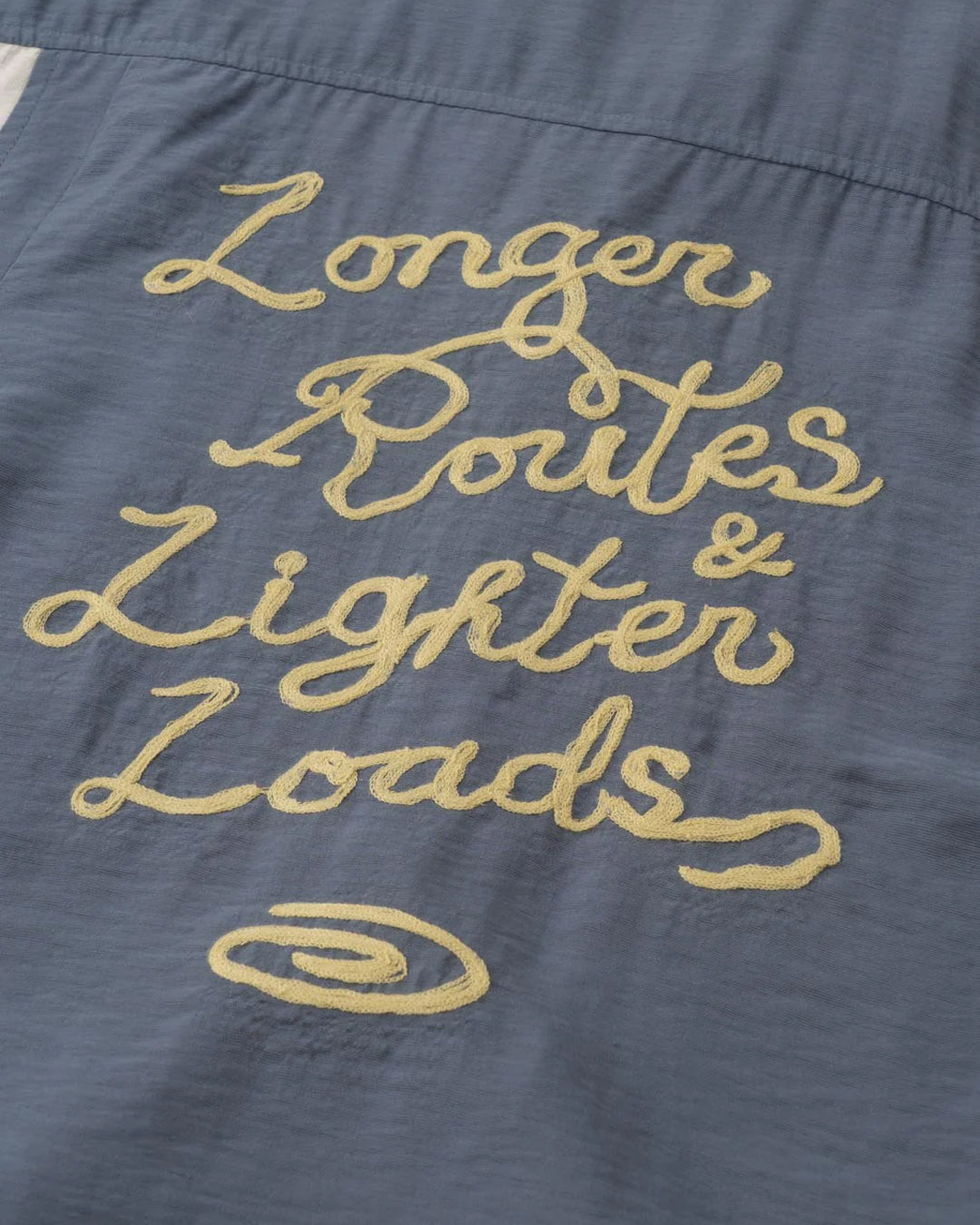 A Eckhaus Latta Shirt pictured on a model in front of a white background. The title of the product is Eckhaus Latta Eclipse Turtleneck - Stone and the image was taken by 199A®.