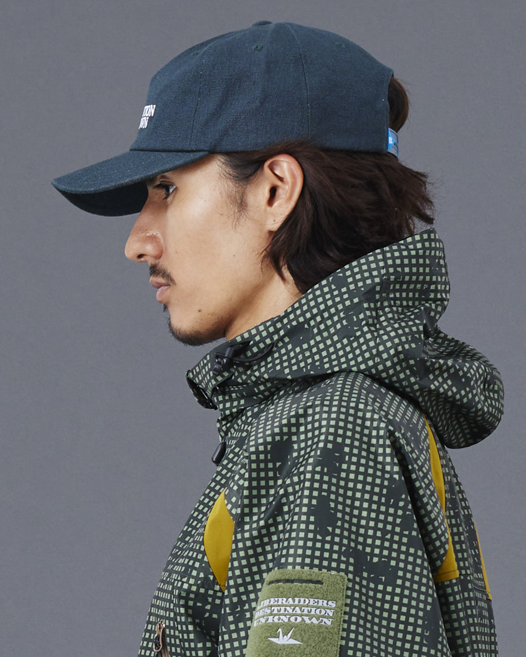 A Eckhaus Latta Shirt pictured on a model in front of a white background. The title of the product is Eckhaus Latta Eclipse Turtleneck - Stone and the image was taken by 199A®.