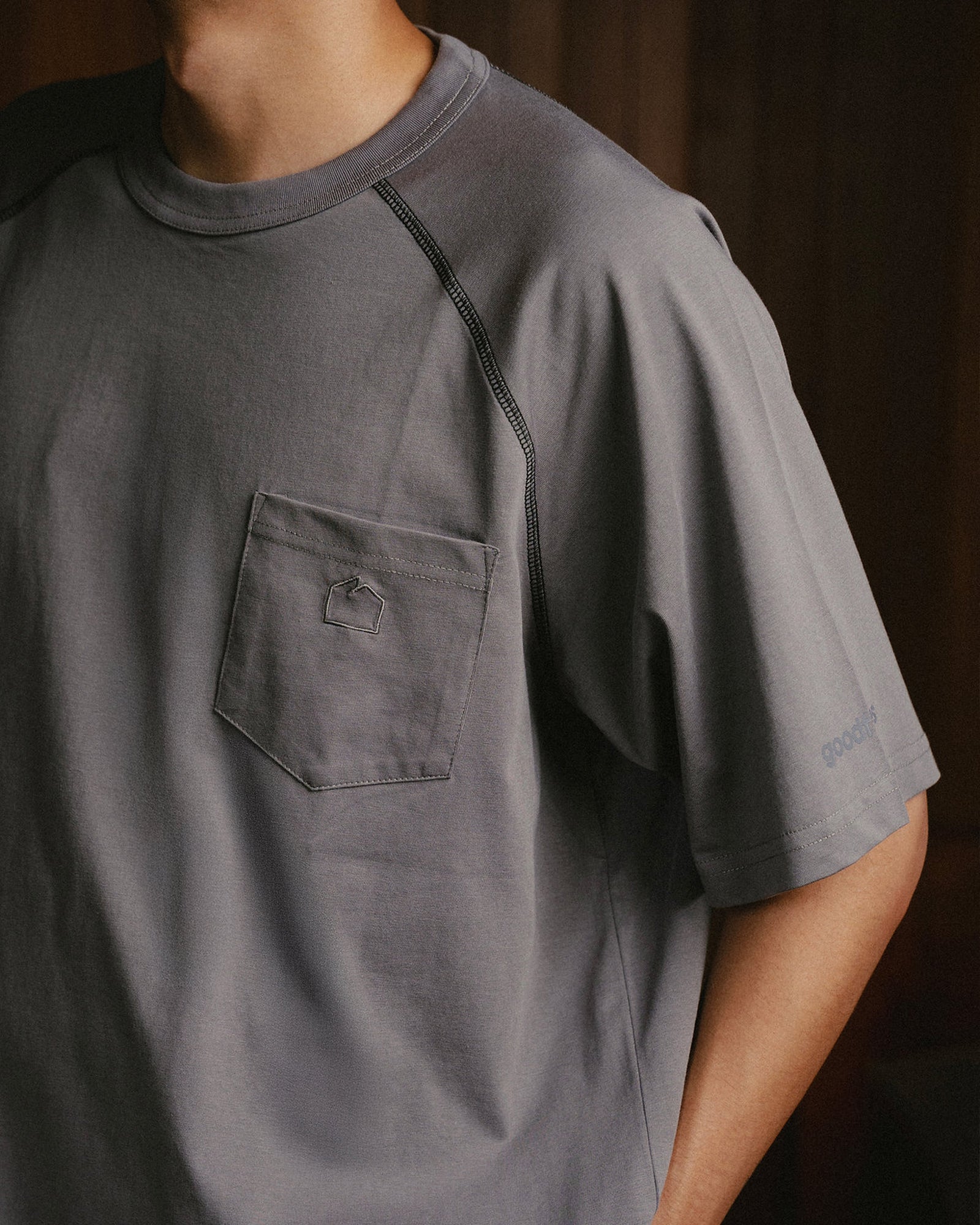 A Eckhaus Latta Shirt pictured on a model in front of a white background. The title of the product is Eckhaus Latta Eclipse Turtleneck - Stone and the image was taken by 199A®.