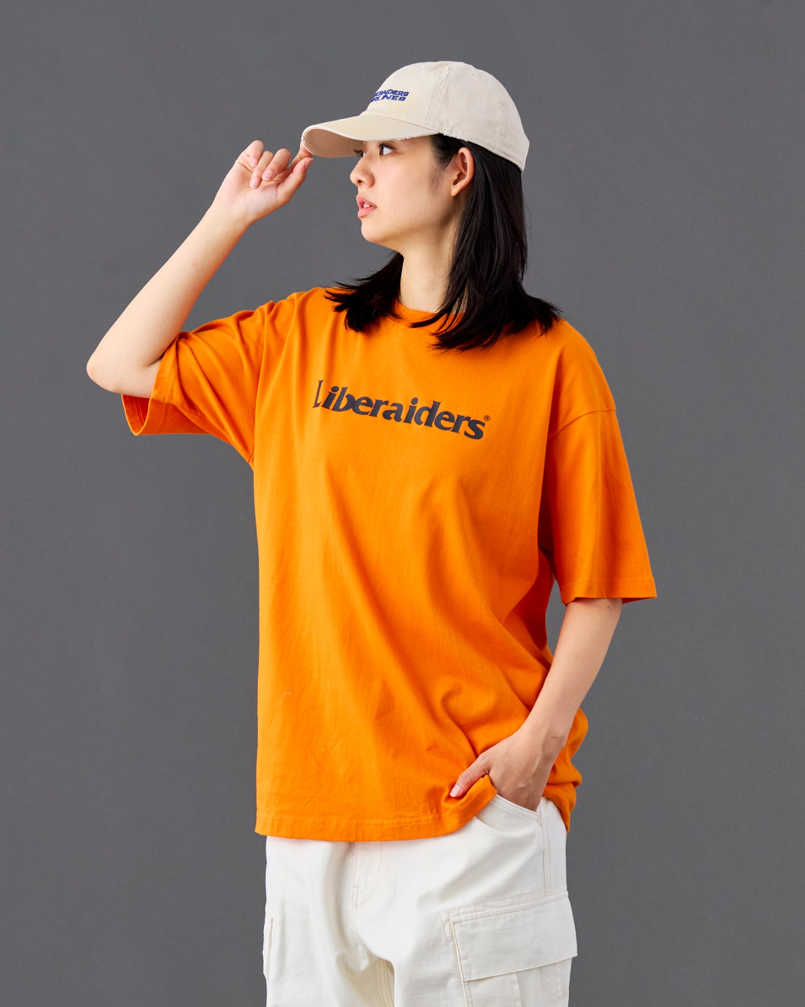 A Eckhaus Latta Shirt pictured on a model in front of a white background. The title of the product is Eckhaus Latta Eclipse Turtleneck - Stone and the image was taken by 199A®.
