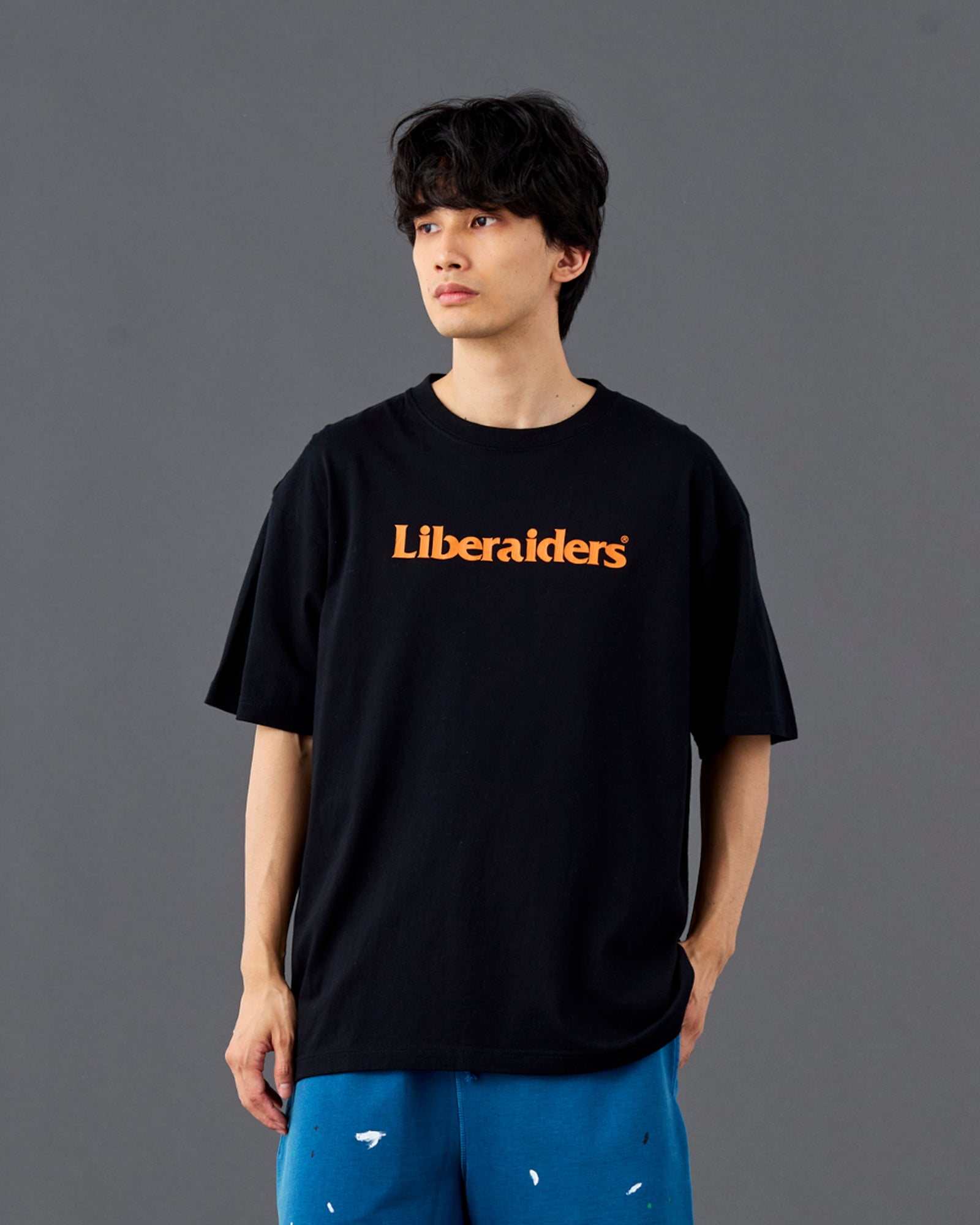 A Eckhaus Latta Shirt pictured on a model in front of a white background. The title of the product is Eckhaus Latta Eclipse Turtleneck - Stone and the image was taken by 199A®.