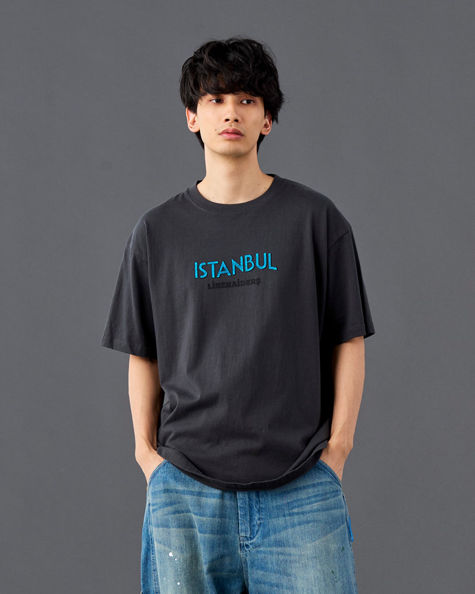 A Eckhaus Latta Shirt pictured on a model in front of a white background. The title of the product is Eckhaus Latta Eclipse Turtleneck - Stone and the image was taken by 199A®.