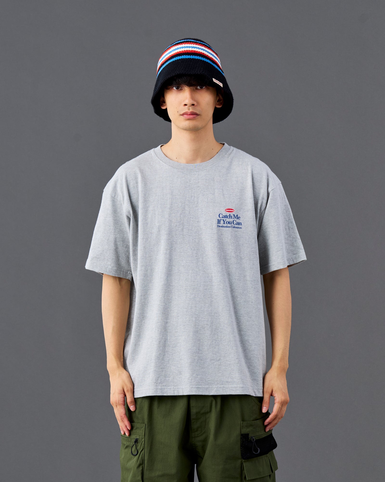 A Eckhaus Latta Shirt pictured on a model in front of a white background. The title of the product is Eckhaus Latta Eclipse Turtleneck - Stone and the image was taken by 199A®.