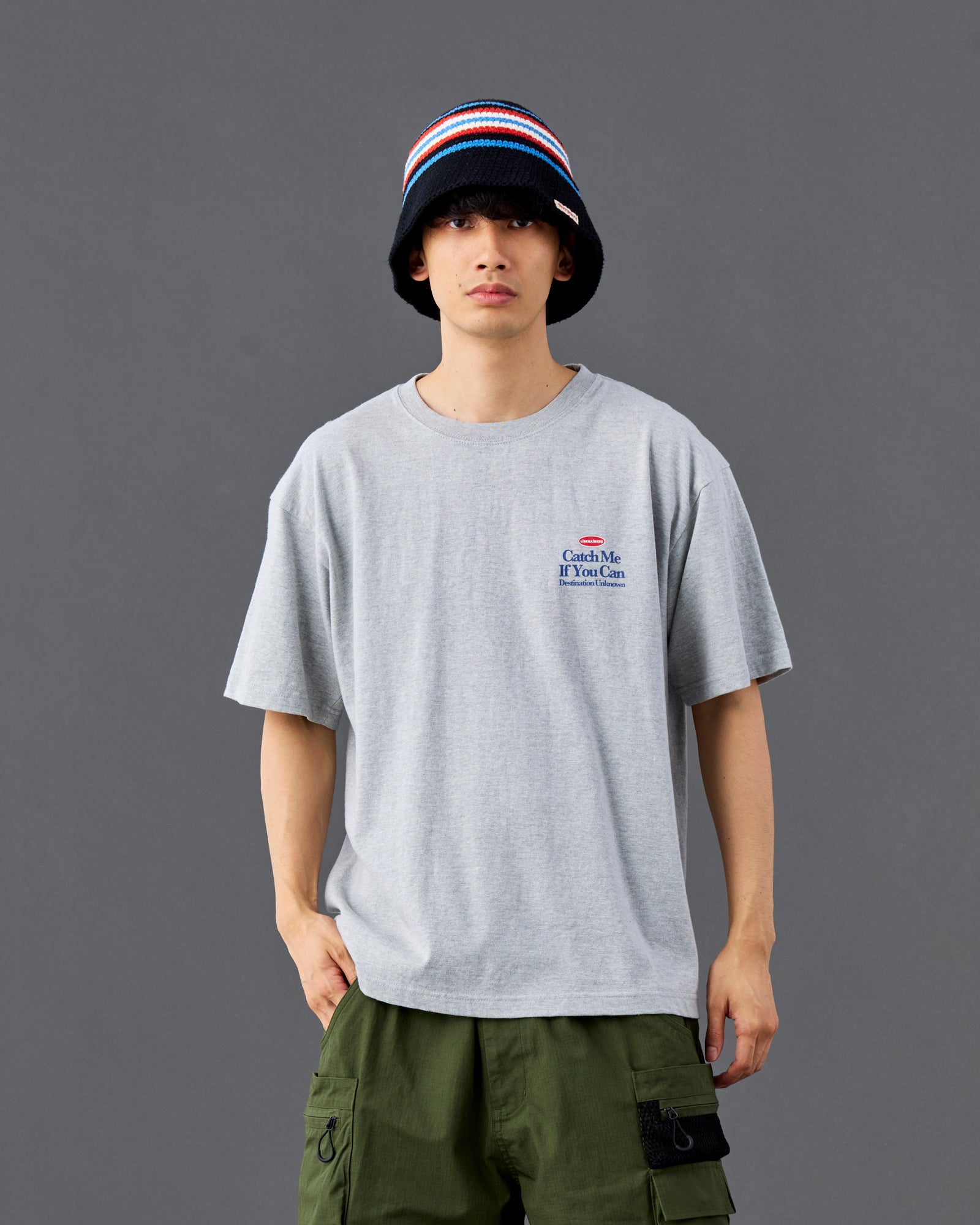 A Eckhaus Latta Shirt pictured on a model in front of a white background. The title of the product is Eckhaus Latta Eclipse Turtleneck - Stone and the image was taken by 199A®.