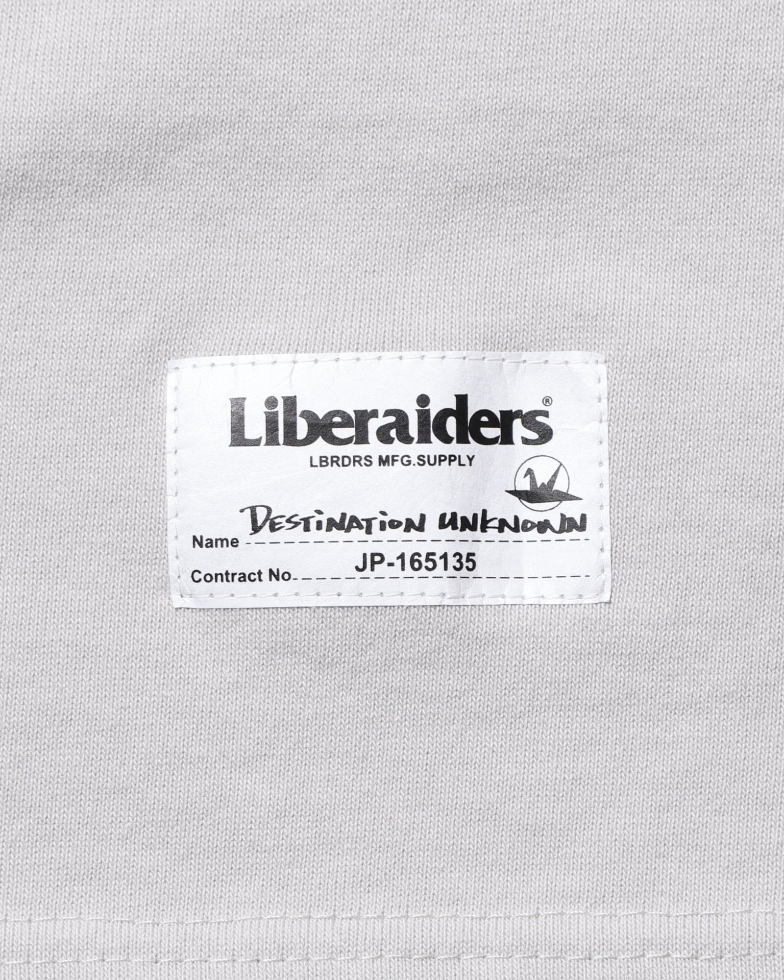 A Eckhaus Latta Shirt pictured on a model in front of a white background. The title of the product is Eckhaus Latta Eclipse Turtleneck - Stone and the image was taken by 199A®.