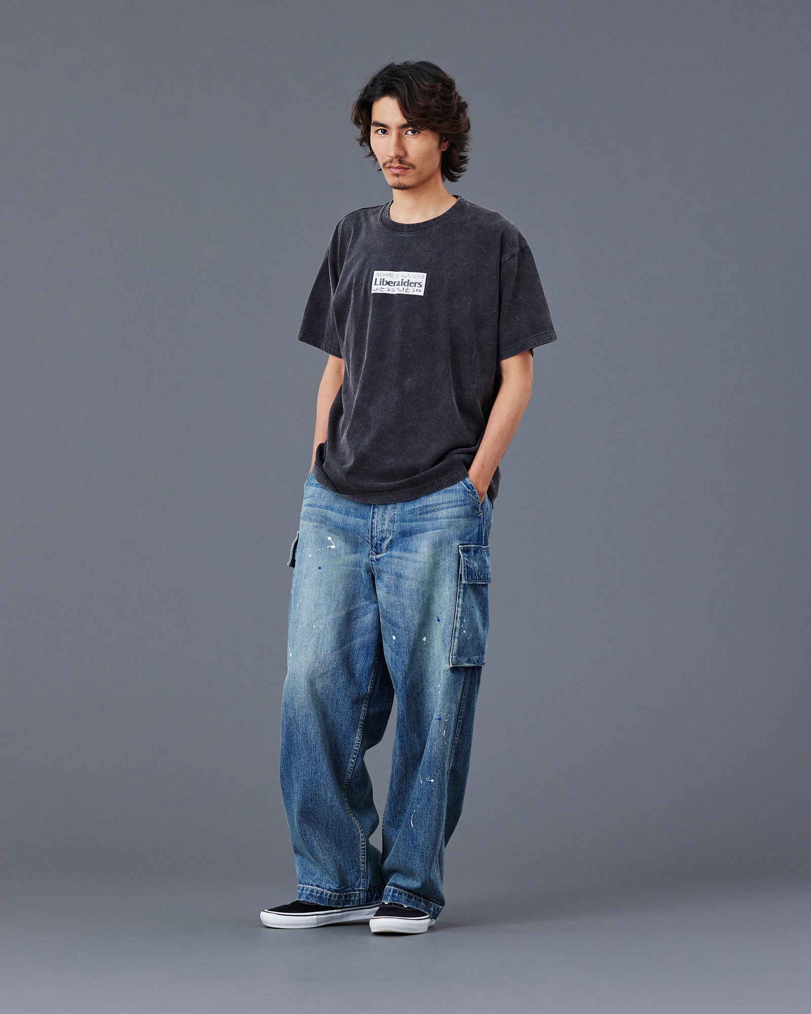 A Eckhaus Latta Shirt pictured on a model in front of a white background. The title of the product is Eckhaus Latta Eclipse Turtleneck - Stone and the image was taken by 199A®.