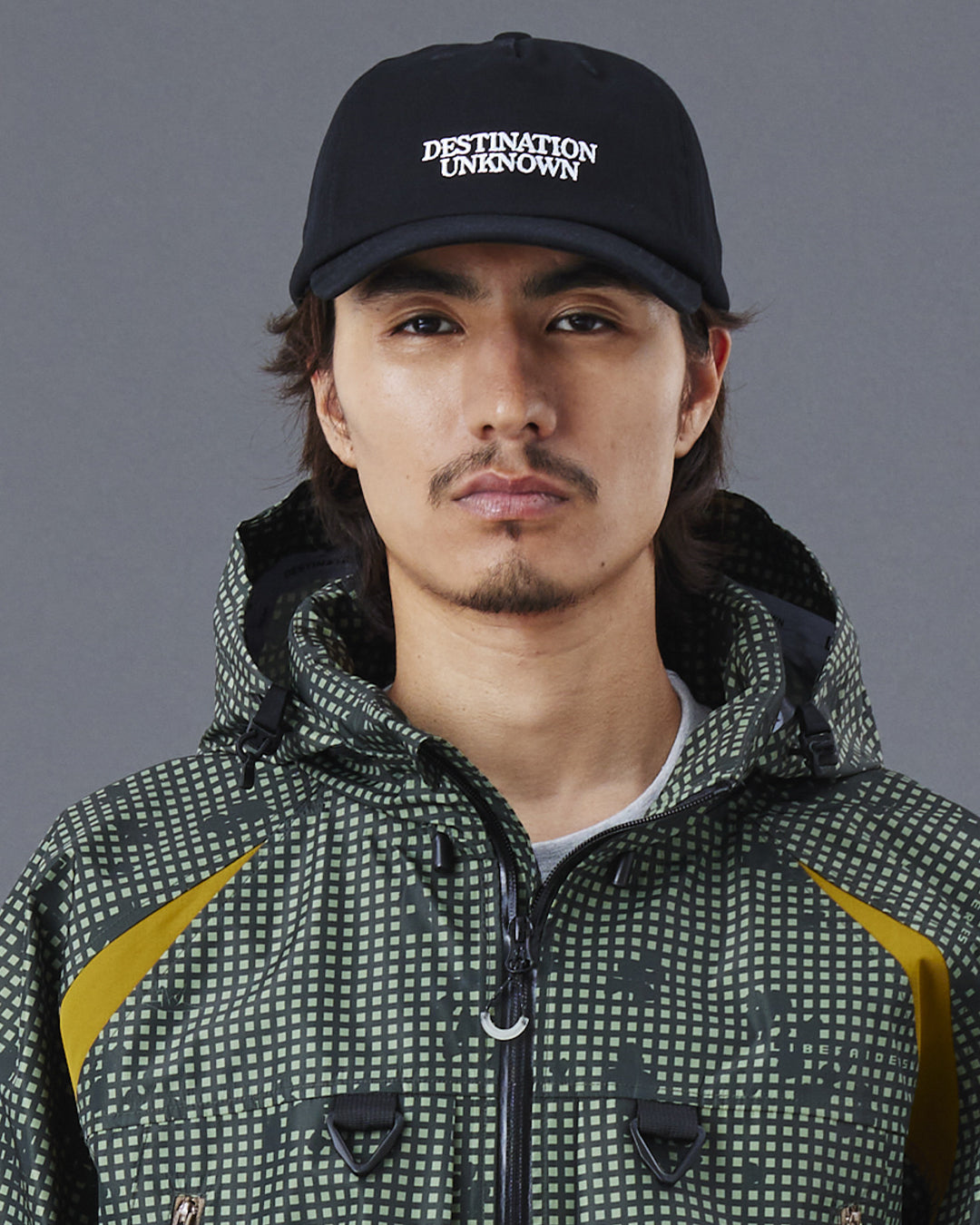 A Eckhaus Latta Shirt pictured on a model in front of a white background. The title of the product is Eckhaus Latta Eclipse Turtleneck - Stone and the image was taken by 199A®.