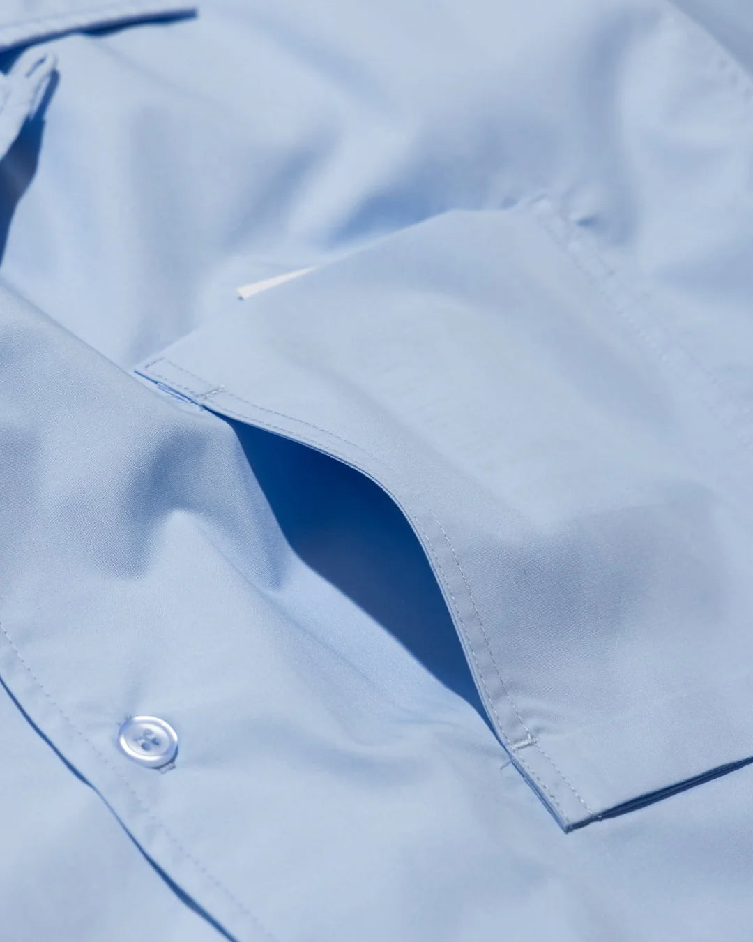 A Eckhaus Latta Shirt pictured on a model in front of a white background. The title of the product is Eckhaus Latta Eclipse Turtleneck - Stone and the image was taken by 199A®.