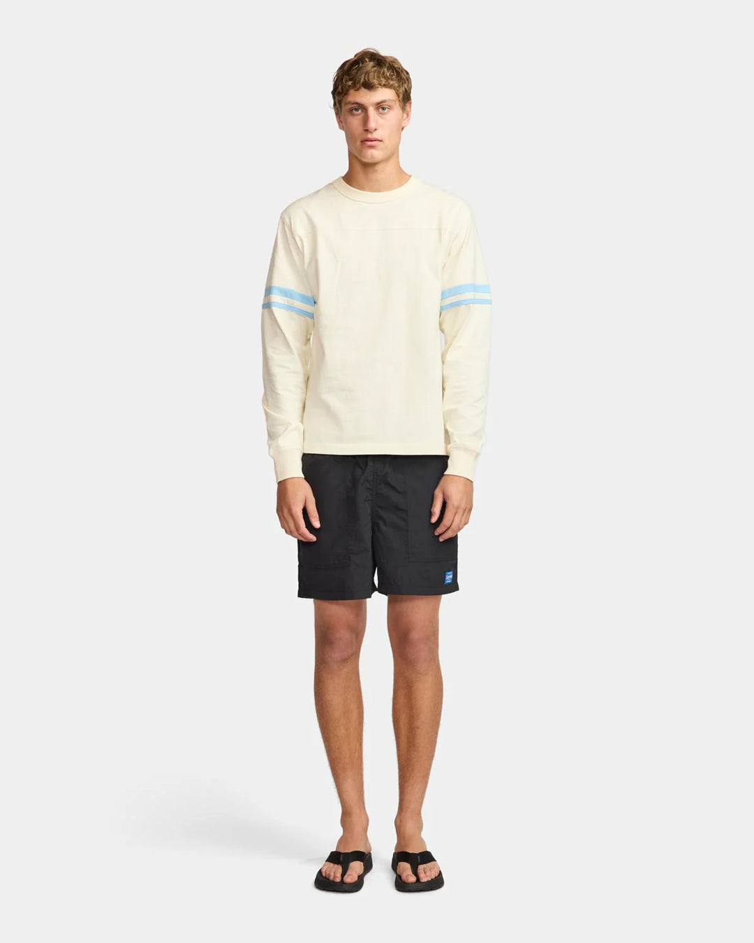 A Eckhaus Latta Shirt pictured on a model in front of a white background. The title of the product is Eckhaus Latta Eclipse Turtleneck - Stone and the image was taken by 199A®.