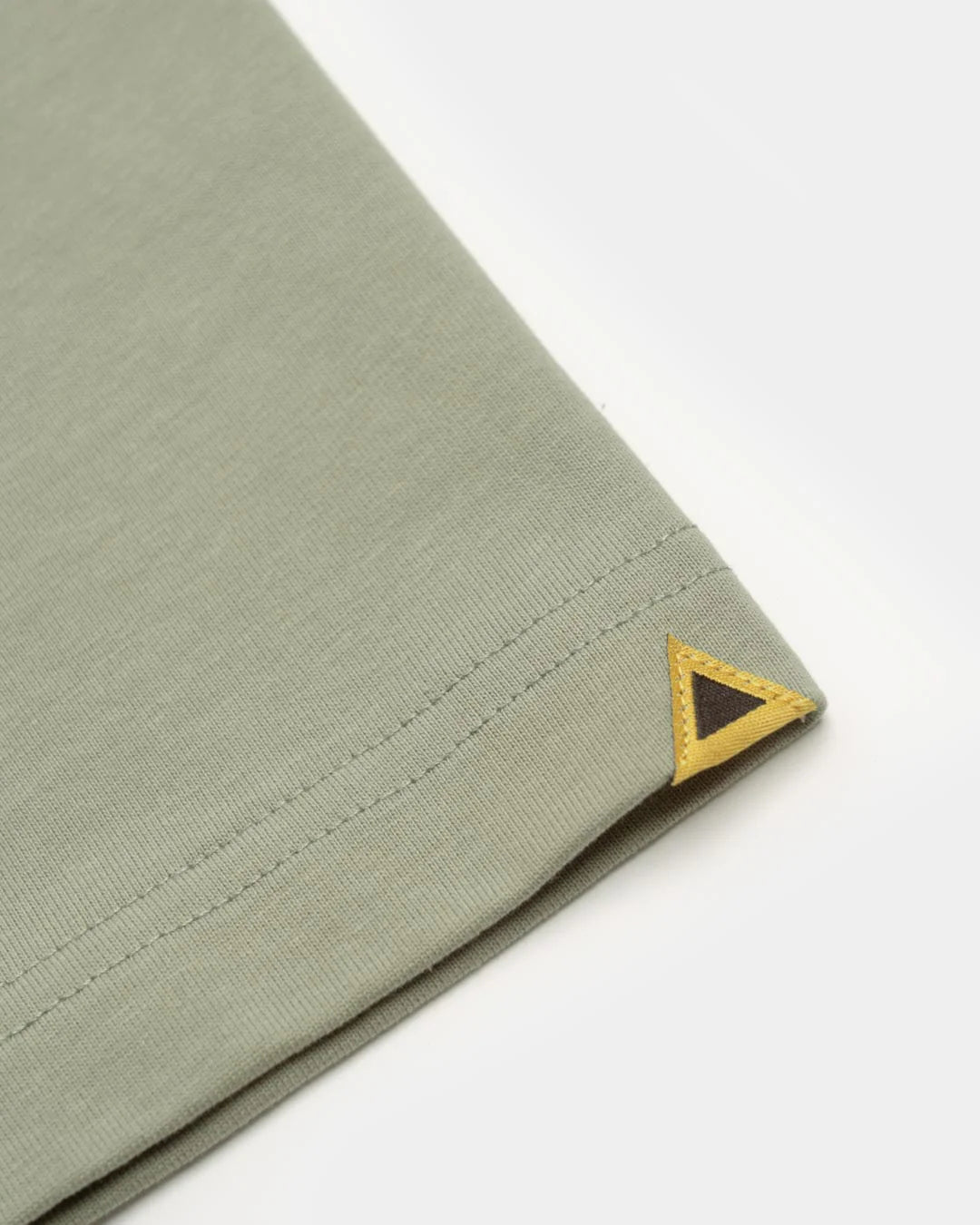 A Eckhaus Latta Shirt pictured on a model in front of a white background. The title of the product is Eckhaus Latta Eclipse Turtleneck - Stone and the image was taken by 199A®.