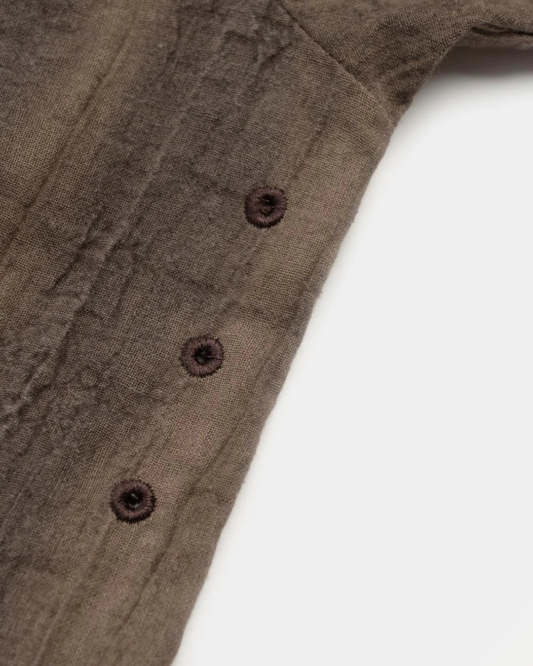 A Eckhaus Latta Shirt pictured on a model in front of a white background. The title of the product is Eckhaus Latta Eclipse Turtleneck - Stone and the image was taken by 199A®.