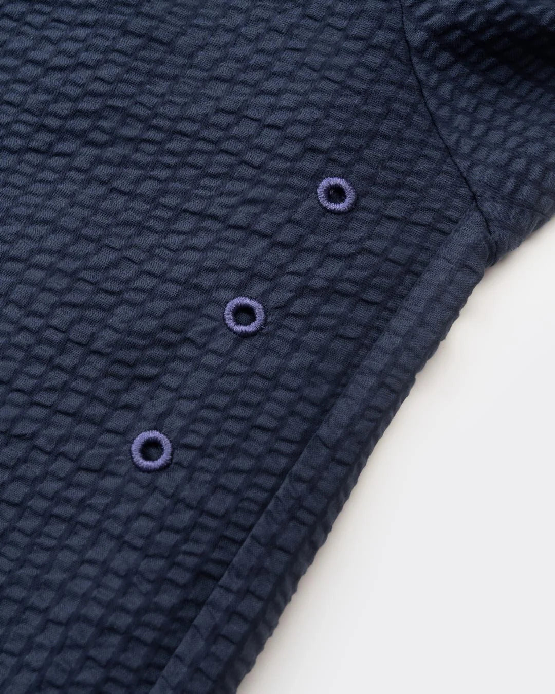A Eckhaus Latta Shirt pictured on a model in front of a white background. The title of the product is Eckhaus Latta Eclipse Turtleneck - Stone and the image was taken by 199A®.