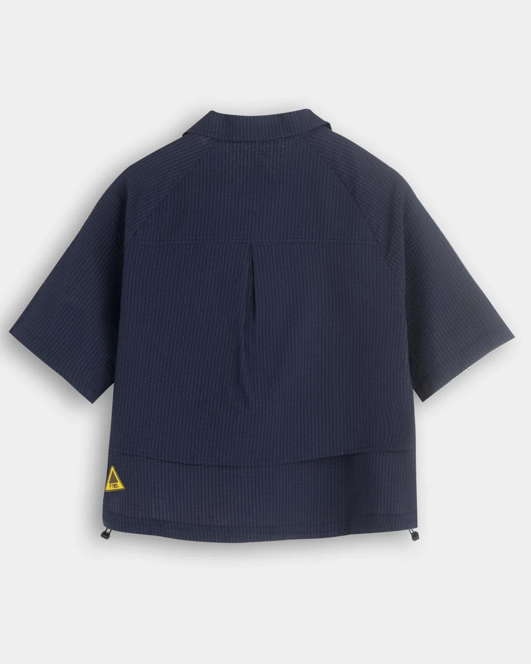A Eckhaus Latta Shirt pictured on a model in front of a white background. The title of the product is Eckhaus Latta Eclipse Turtleneck - Stone and the image was taken by 199A®.