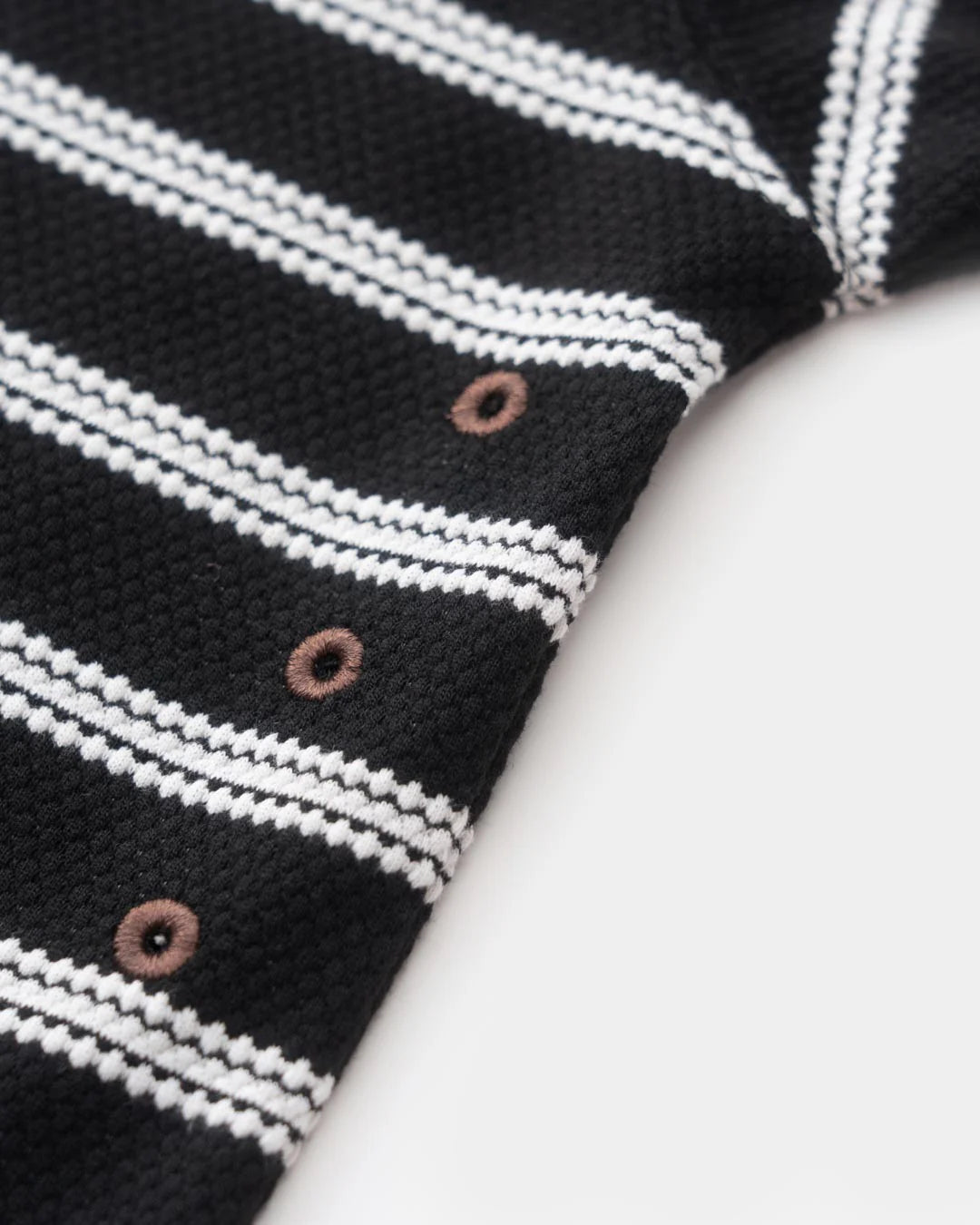 A Eckhaus Latta Shirt pictured on a model in front of a white background. The title of the product is Eckhaus Latta Eclipse Turtleneck - Stone and the image was taken by 199A®.