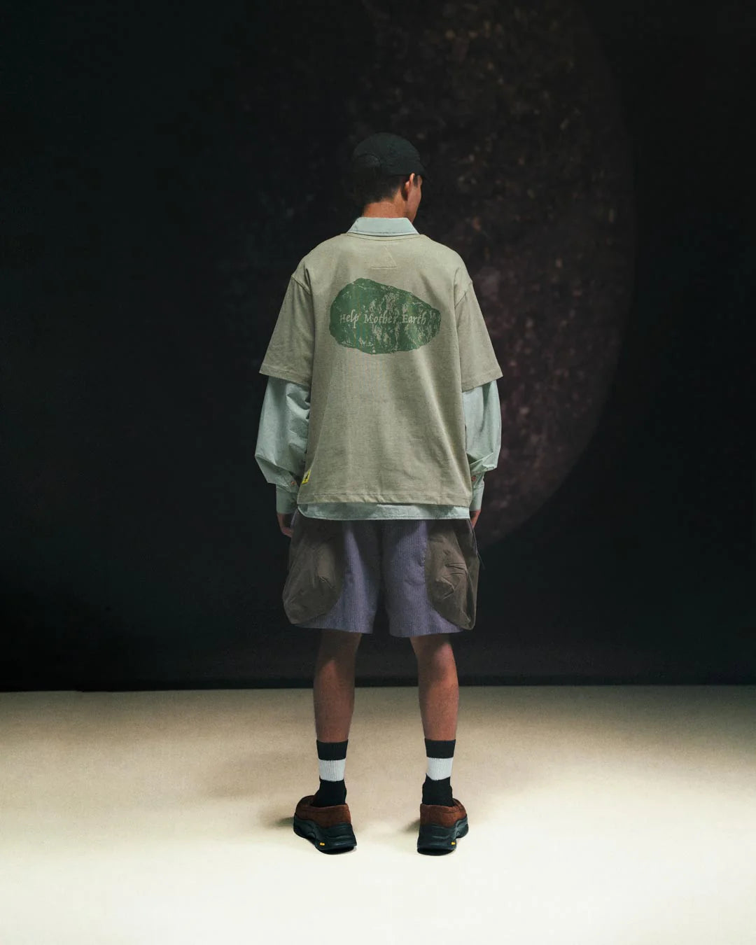 A Eckhaus Latta Shirt pictured on a model in front of a white background. The title of the product is Eckhaus Latta Eclipse Turtleneck - Stone and the image was taken by 199A®.