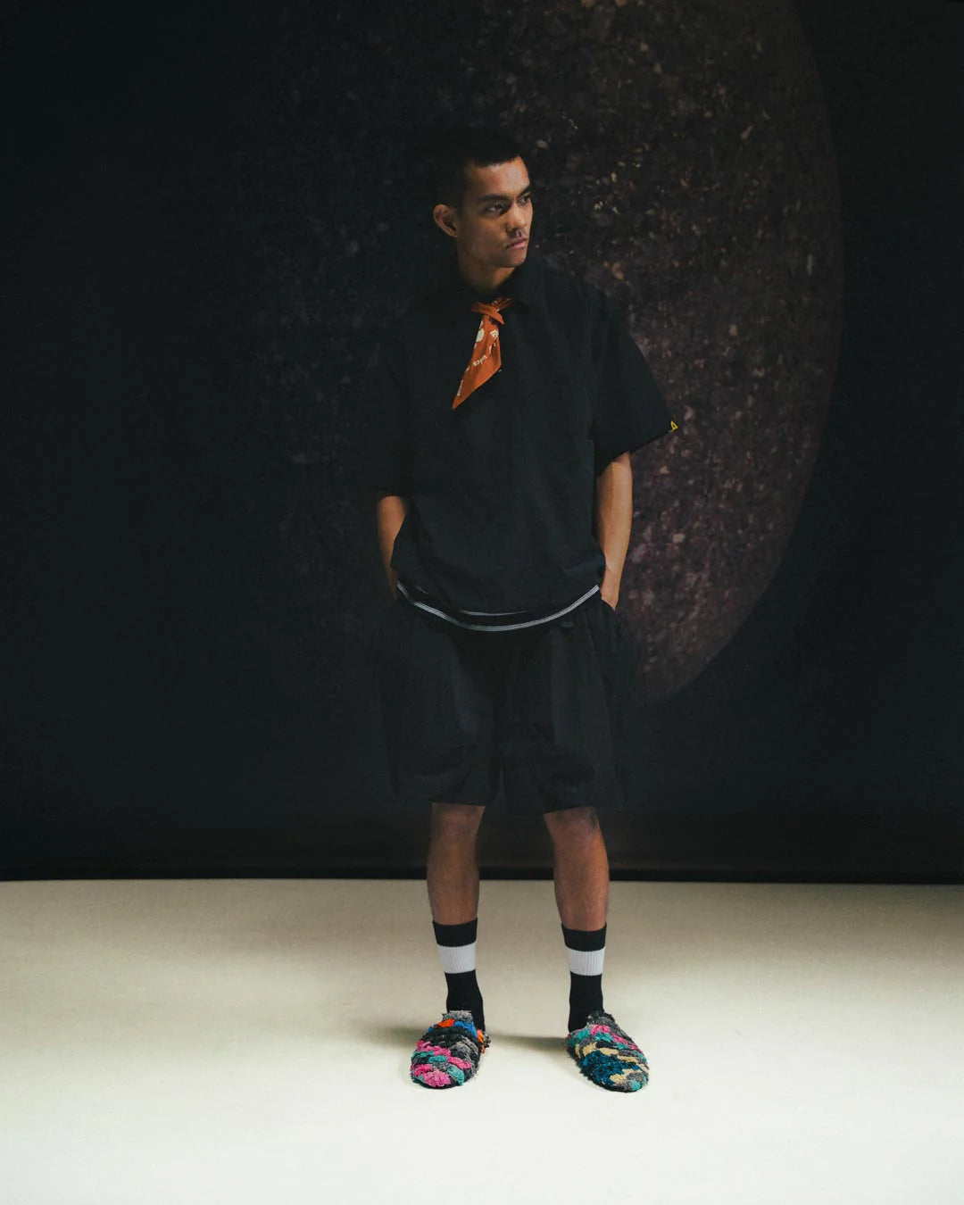 A Eckhaus Latta Shirt pictured on a model in front of a white background. The title of the product is Eckhaus Latta Eclipse Turtleneck - Stone and the image was taken by 199A®.