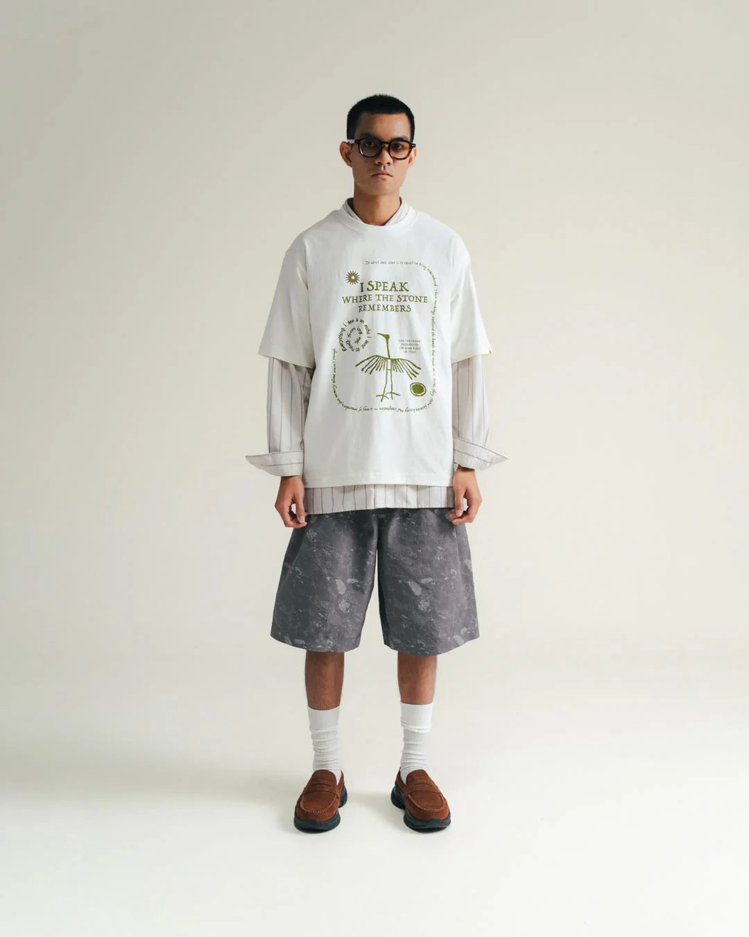 A Eckhaus Latta Shirt pictured on a model in front of a white background. The title of the product is Eckhaus Latta Eclipse Turtleneck - Stone and the image was taken by 199A®.