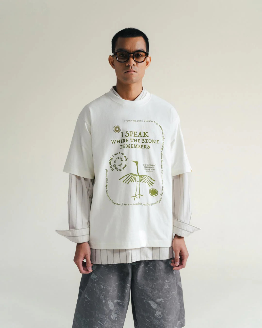 A Eckhaus Latta Shirt pictured on a model in front of a white background. The title of the product is Eckhaus Latta Eclipse Turtleneck - Stone and the image was taken by 199A®.