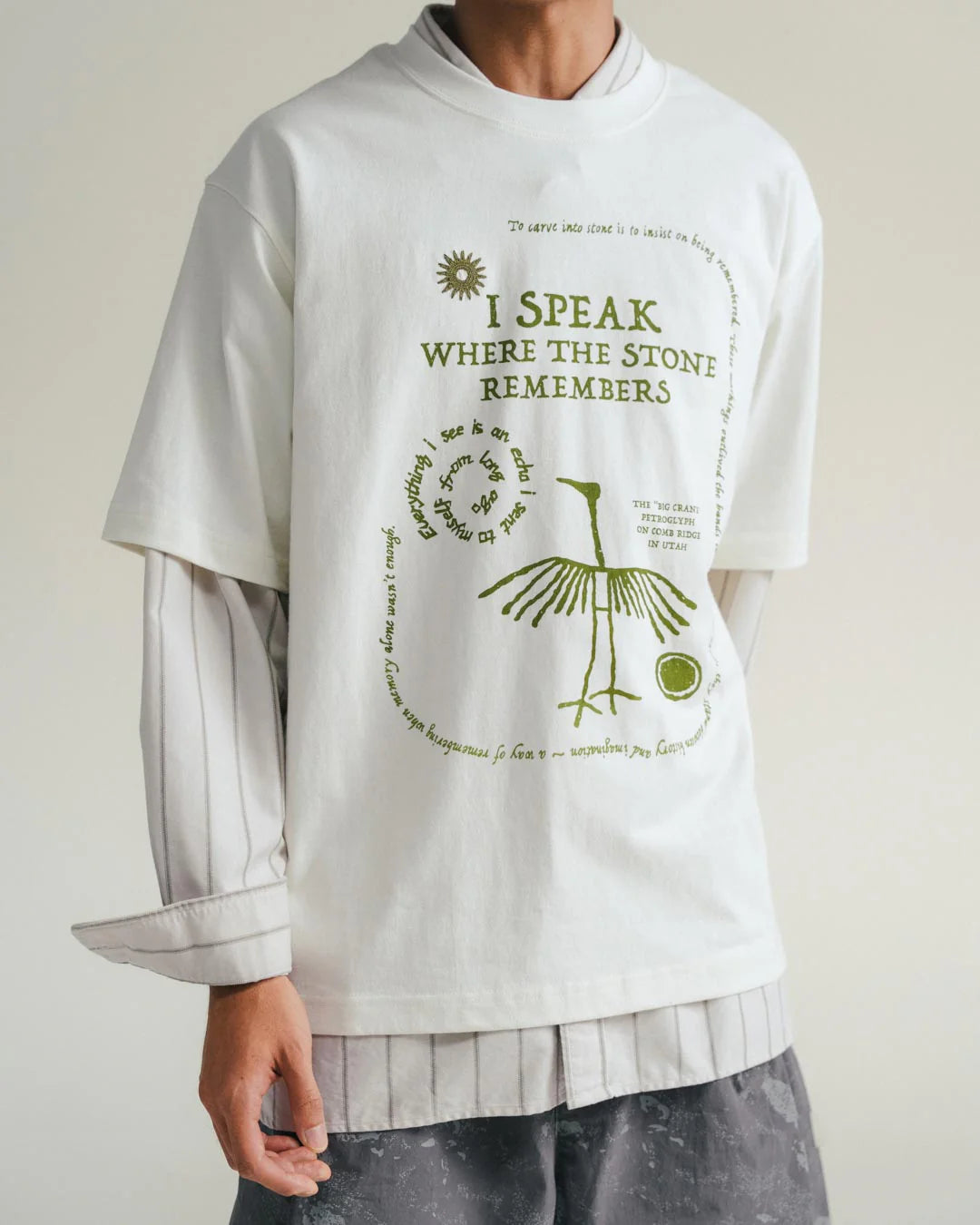 A Eckhaus Latta Shirt pictured on a model in front of a white background. The title of the product is Eckhaus Latta Eclipse Turtleneck - Stone and the image was taken by 199A®.