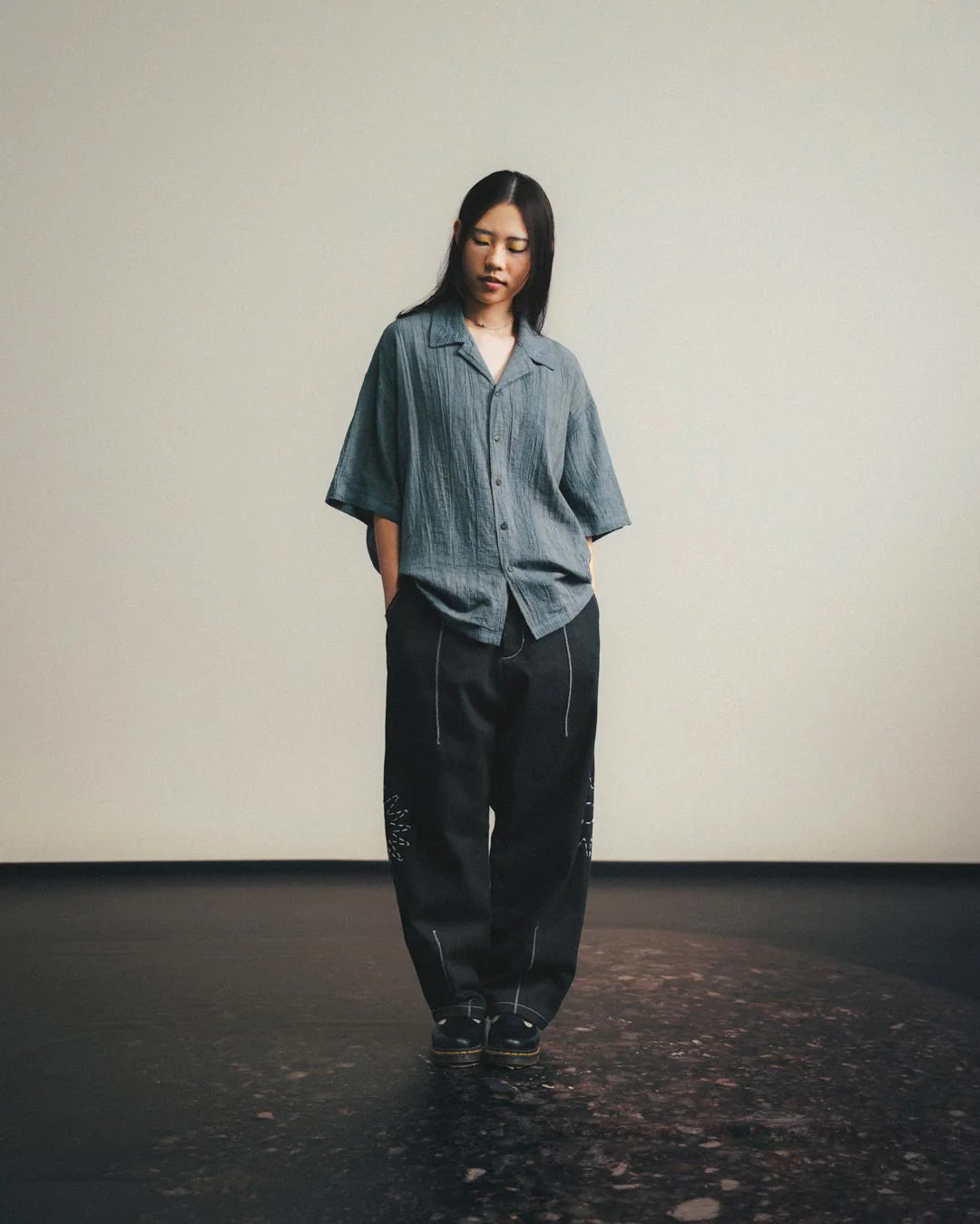 A Eckhaus Latta Shirt pictured on a model in front of a white background. The title of the product is Eckhaus Latta Eclipse Turtleneck - Stone and the image was taken by 199A®.