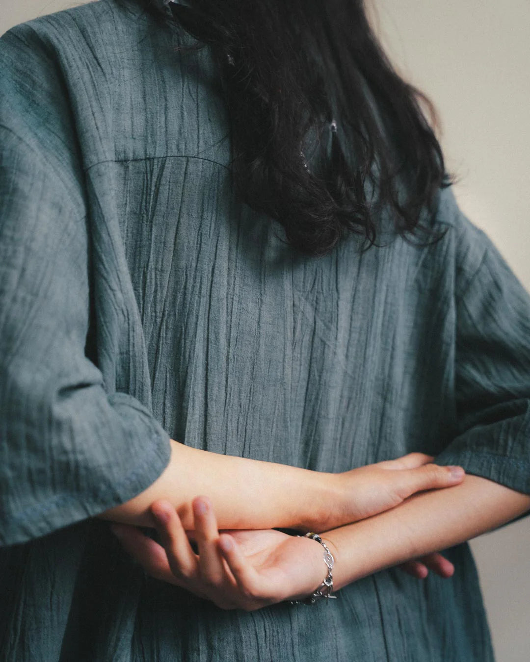 A Eckhaus Latta Shirt pictured on a model in front of a white background. The title of the product is Eckhaus Latta Eclipse Turtleneck - Stone and the image was taken by 199A®.