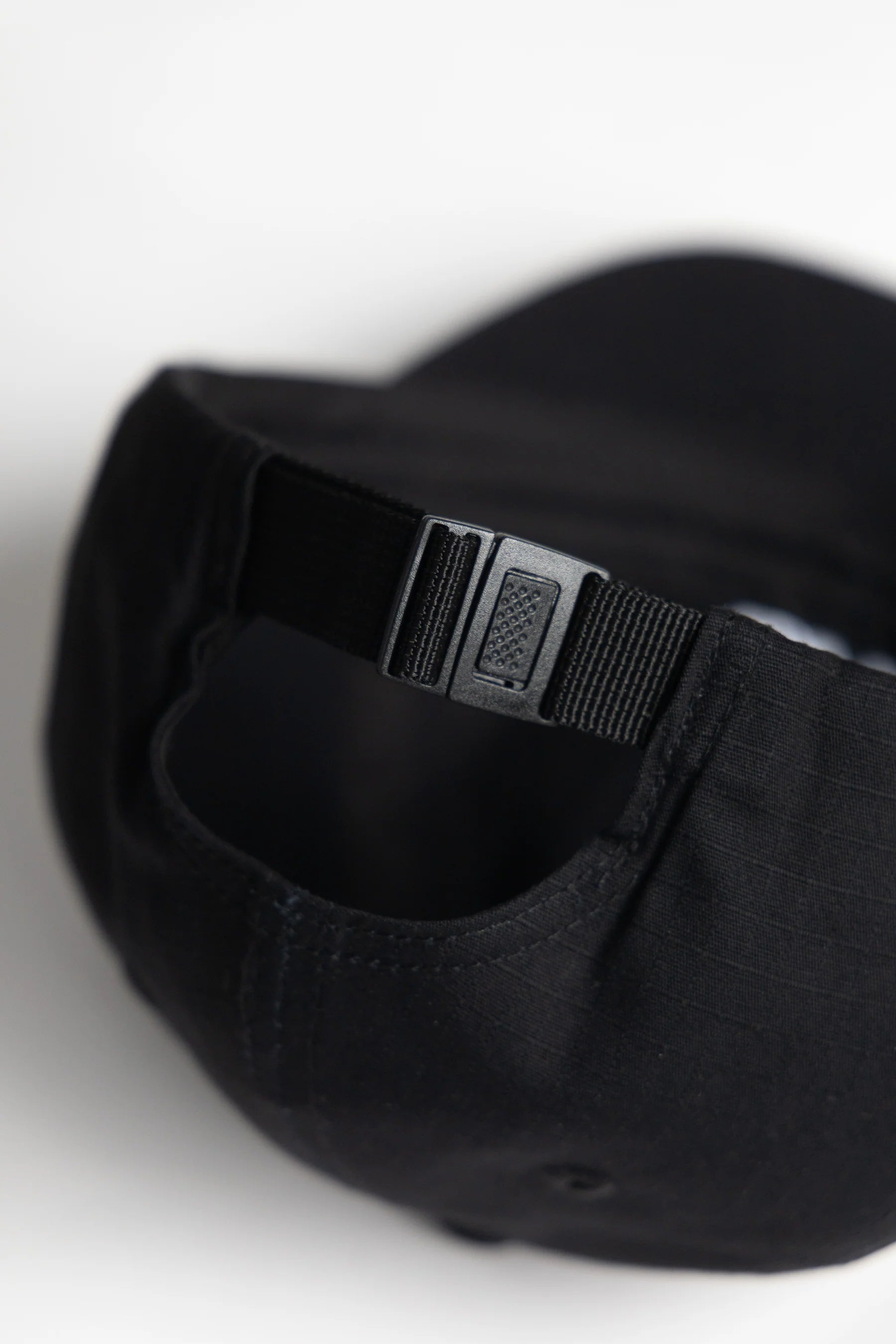 A Eckhaus Latta Shirt pictured on a model in front of a white background. The title of the product is Eckhaus Latta Eclipse Turtleneck - Stone and the image was taken by 199A®.