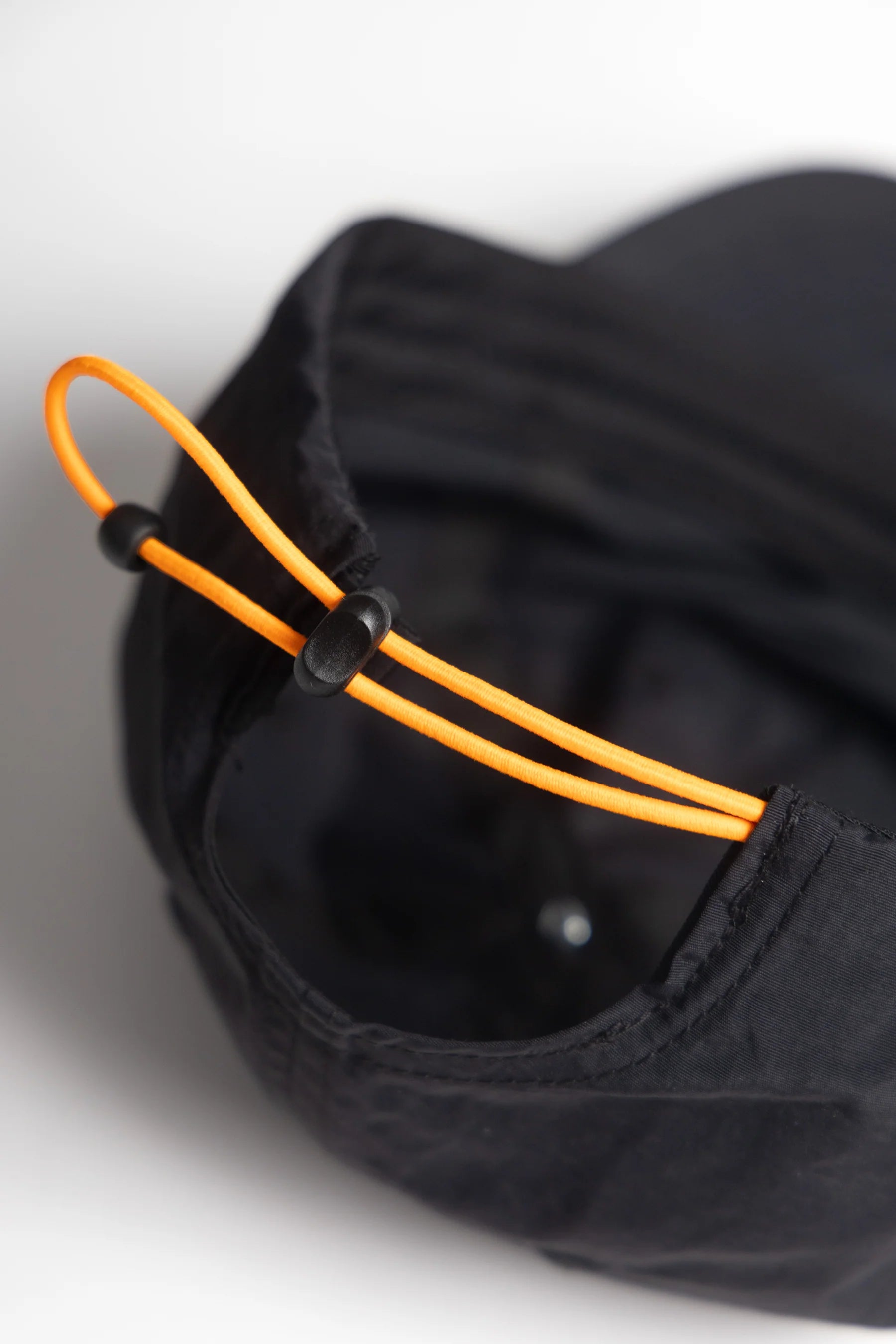 A Eckhaus Latta Shirt pictured on a model in front of a white background. The title of the product is Eckhaus Latta Eclipse Turtleneck - Stone and the image was taken by 199A®.