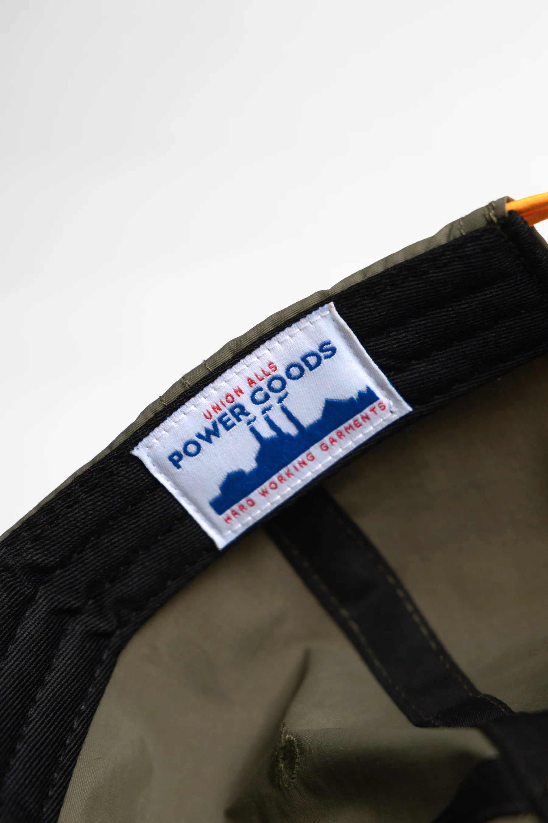 A Eckhaus Latta Shirt pictured on a model in front of a white background. The title of the product is Eckhaus Latta Eclipse Turtleneck - Stone and the image was taken by 199A®.