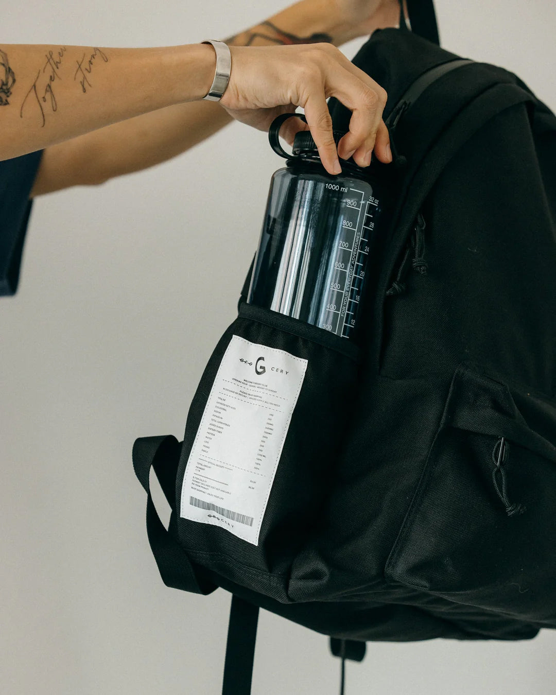 A Eckhaus Latta Shirt pictured on a model in front of a white background. The title of the product is Eckhaus Latta Eclipse Turtleneck - Stone and the image was taken by 199A®.