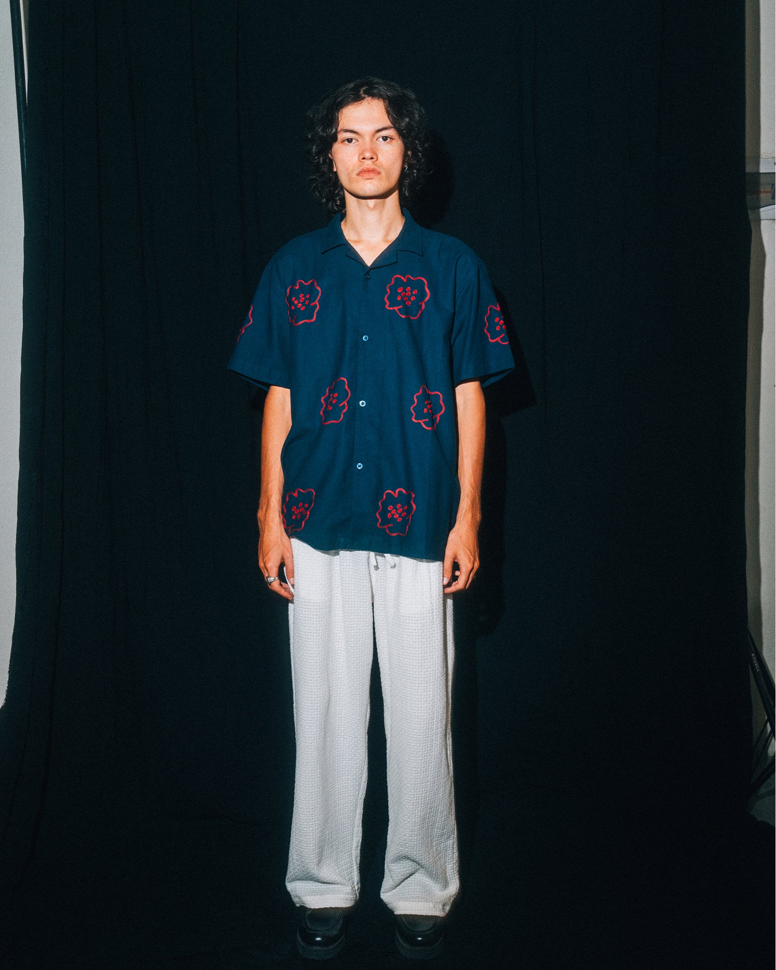 A Eckhaus Latta Shirt pictured on a model in front of a white background. The title of the product is Eckhaus Latta Eclipse Turtleneck - Stone and the image was taken by 199A®.