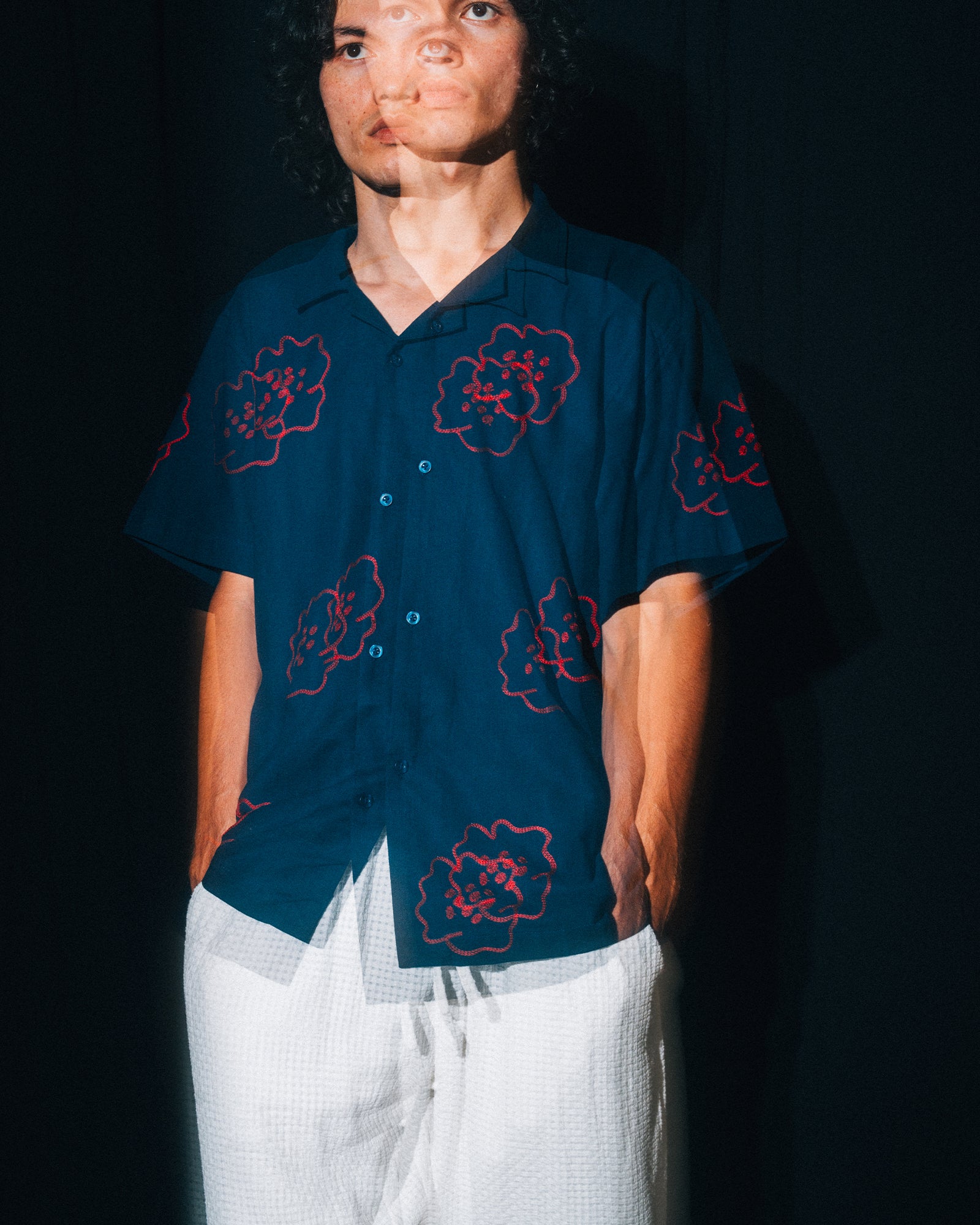 A Eckhaus Latta Shirt pictured on a model in front of a white background. The title of the product is Eckhaus Latta Eclipse Turtleneck - Stone and the image was taken by 199A®.