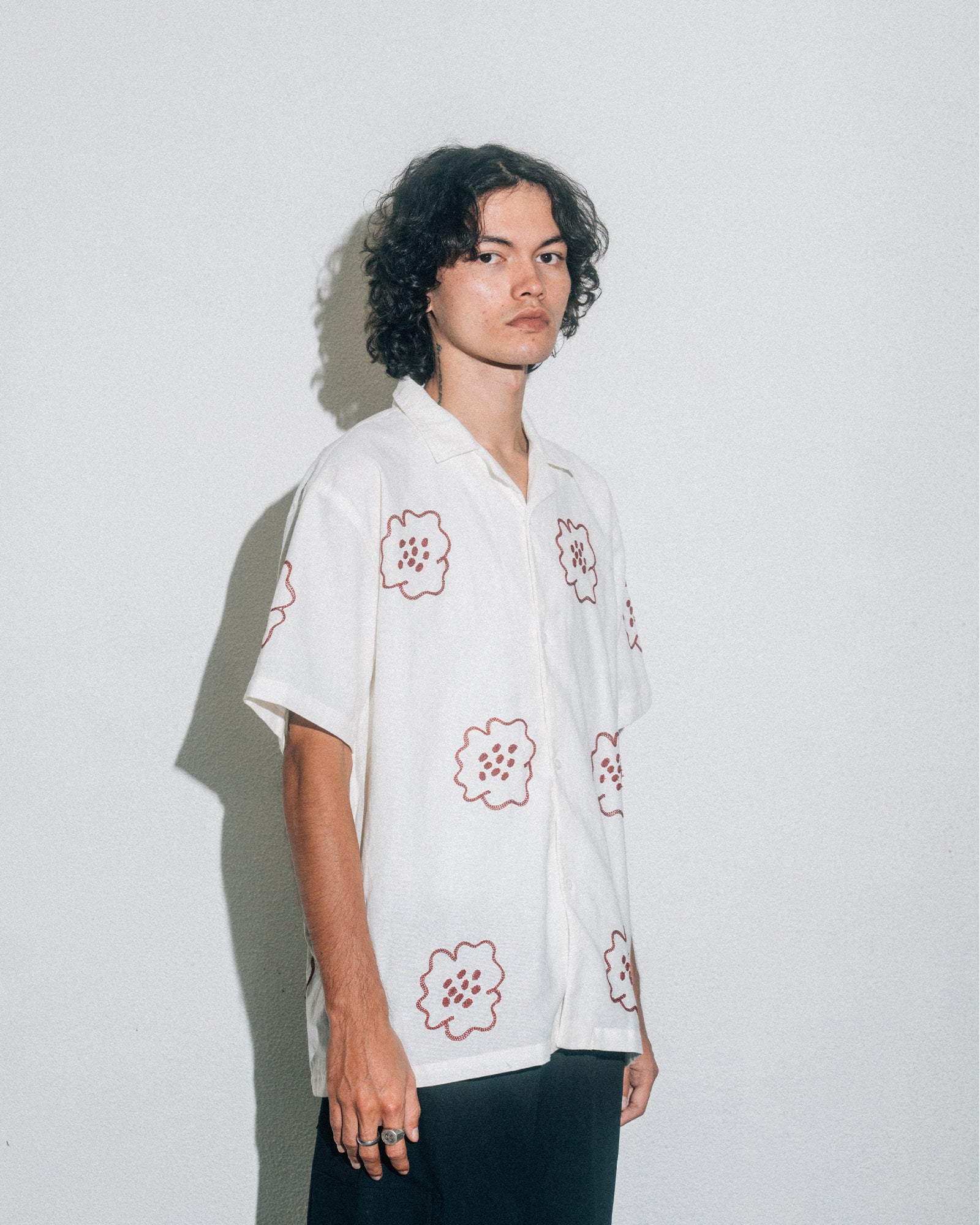 A Eckhaus Latta Shirt pictured on a model in front of a white background. The title of the product is Eckhaus Latta Eclipse Turtleneck - Stone and the image was taken by 199A®.