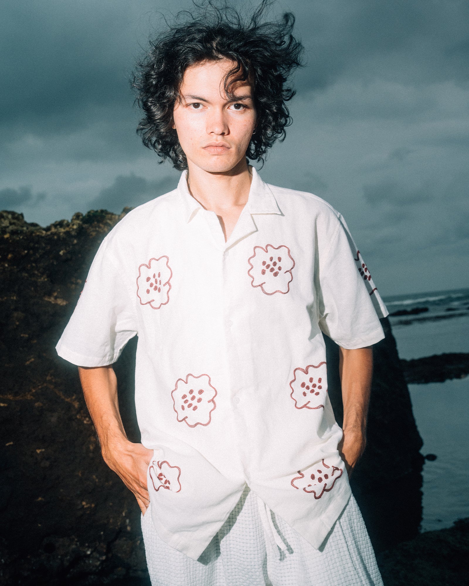 A Eckhaus Latta Shirt pictured on a model in front of a white background. The title of the product is Eckhaus Latta Eclipse Turtleneck - Stone and the image was taken by 199A®.