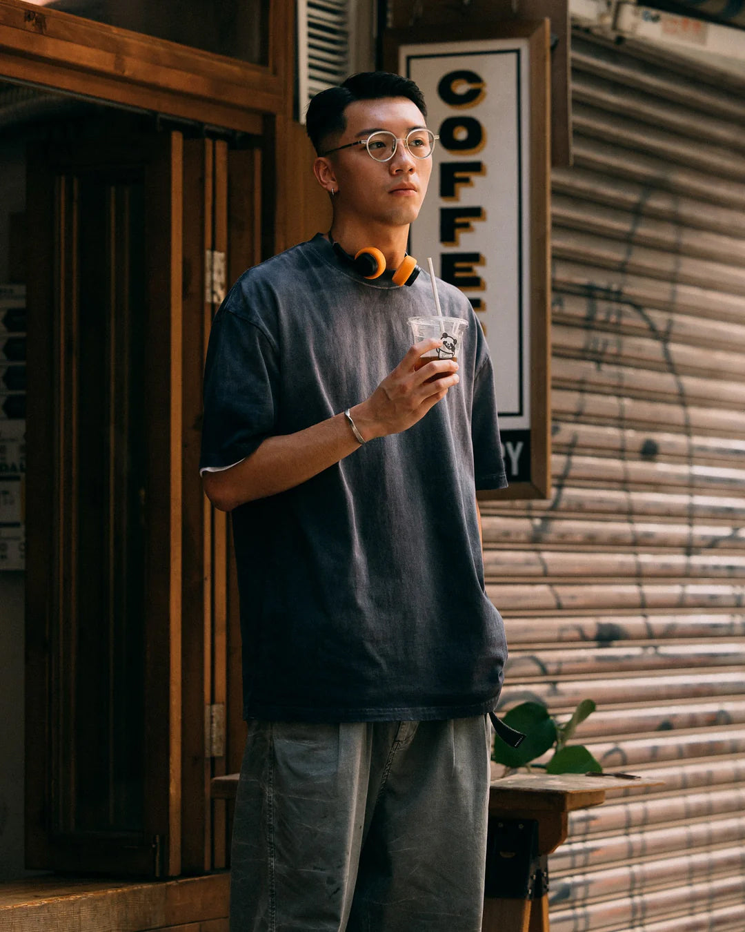 A Eckhaus Latta Shirt pictured on a model in front of a white background. The title of the product is Eckhaus Latta Eclipse Turtleneck - Stone and the image was taken by 199A®.