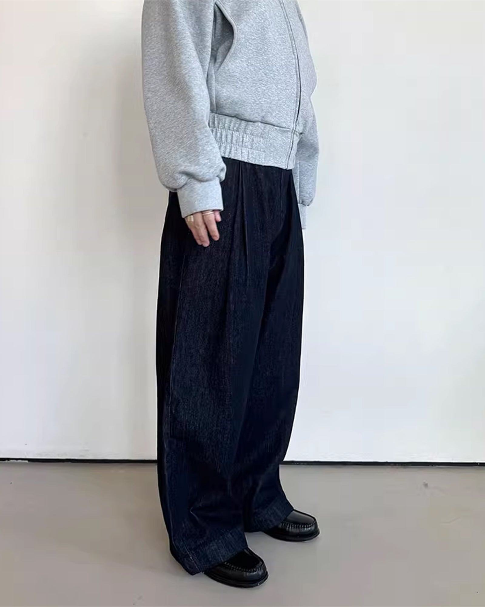 A Eckhaus Latta Shirt pictured on a model in front of a white background. The title of the product is Eckhaus Latta Eclipse Turtleneck - Stone and the image was taken by 199A®.