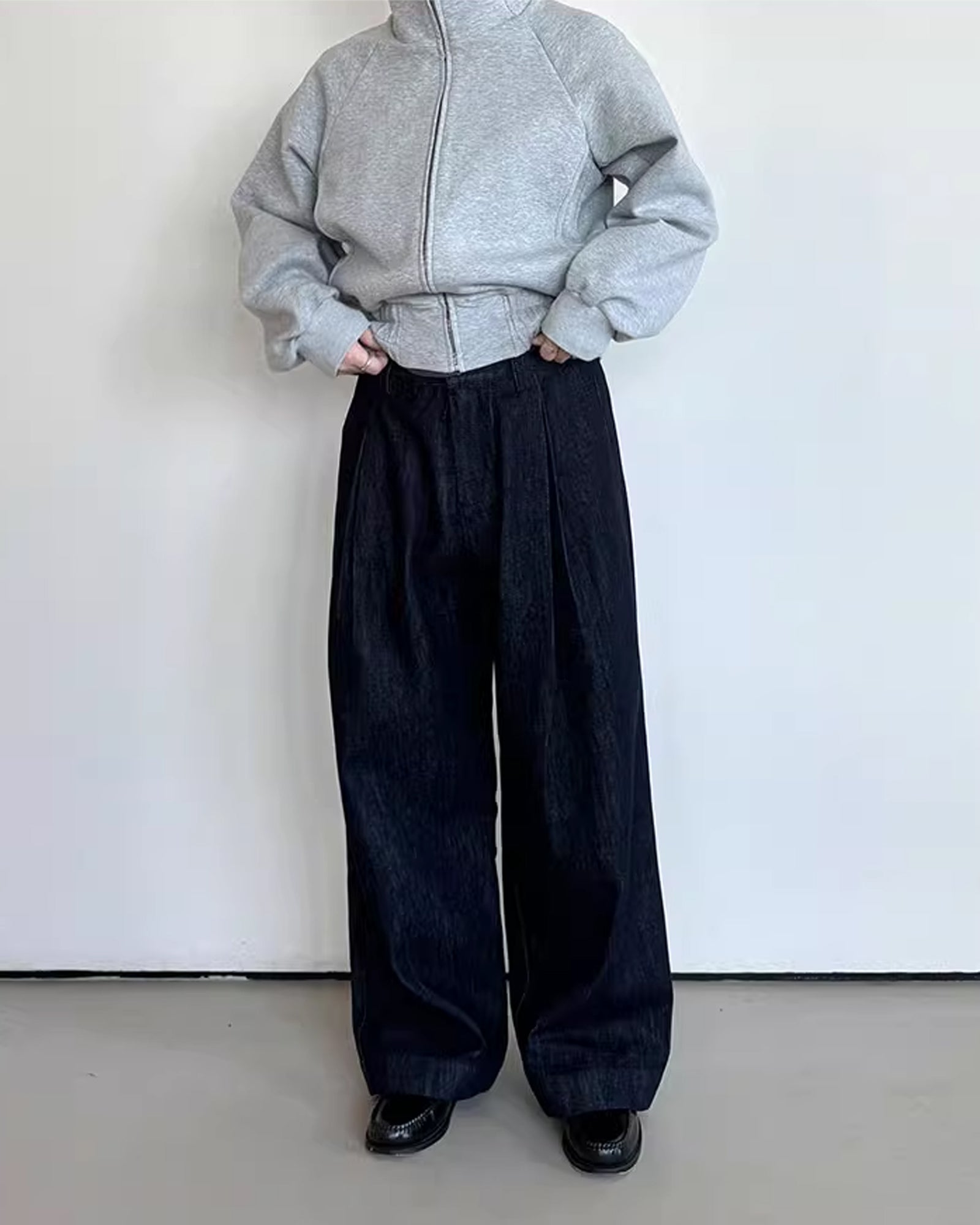 A Eckhaus Latta Shirt pictured on a model in front of a white background. The title of the product is Eckhaus Latta Eclipse Turtleneck - Stone and the image was taken by 199A®.