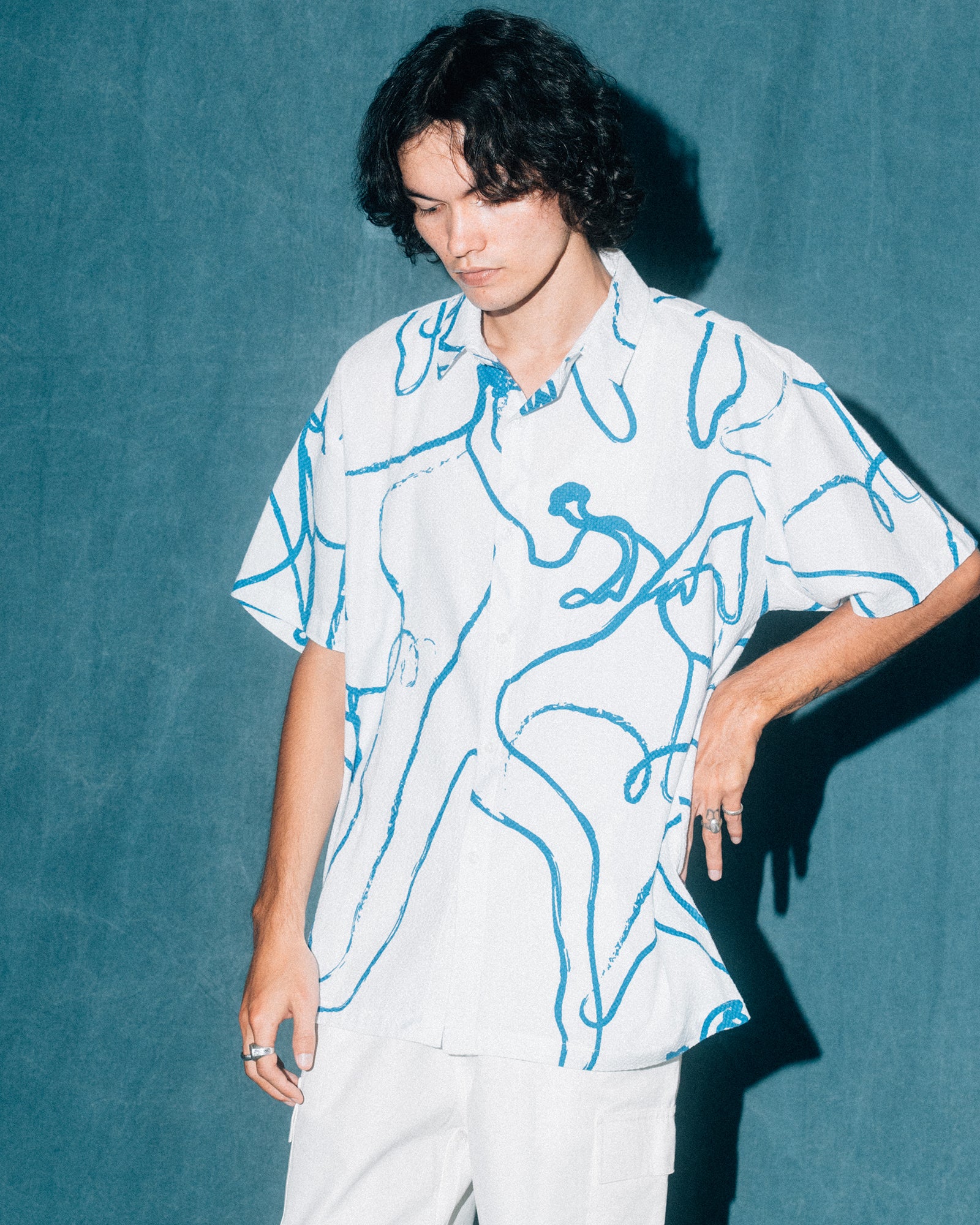 A Eckhaus Latta Shirt pictured on a model in front of a white background. The title of the product is Eckhaus Latta Eclipse Turtleneck - Stone and the image was taken by 199A®.