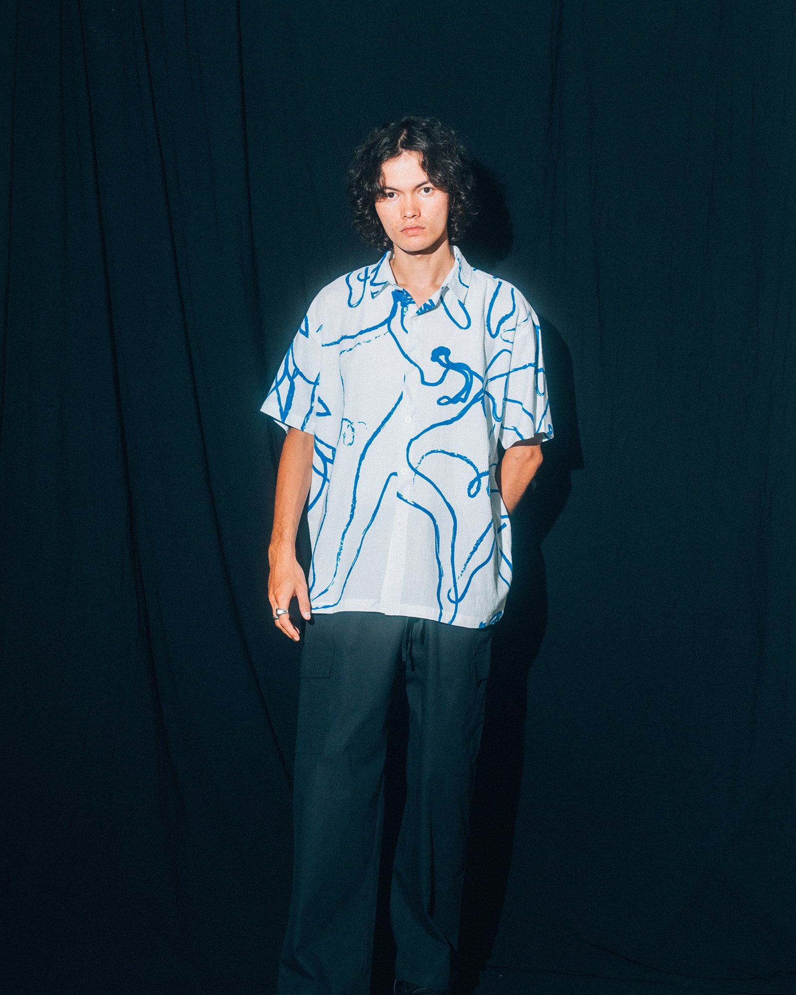 A Eckhaus Latta Shirt pictured on a model in front of a white background. The title of the product is Eckhaus Latta Eclipse Turtleneck - Stone and the image was taken by 199A®.