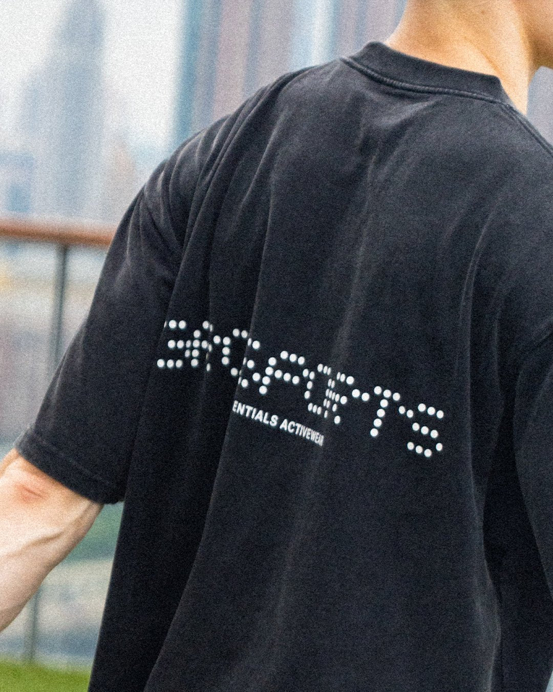 A Eckhaus Latta Shirt pictured on a model in front of a white background. The title of the product is Eckhaus Latta Eclipse Turtleneck - Stone and the image was taken by 199A®.