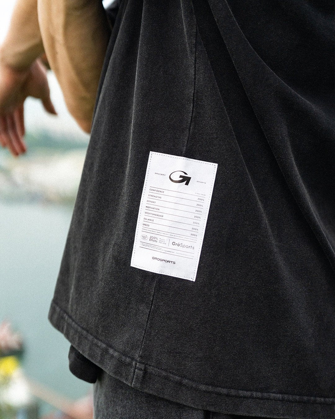 A Eckhaus Latta Shirt pictured on a model in front of a white background. The title of the product is Eckhaus Latta Eclipse Turtleneck - Stone and the image was taken by 199A®.