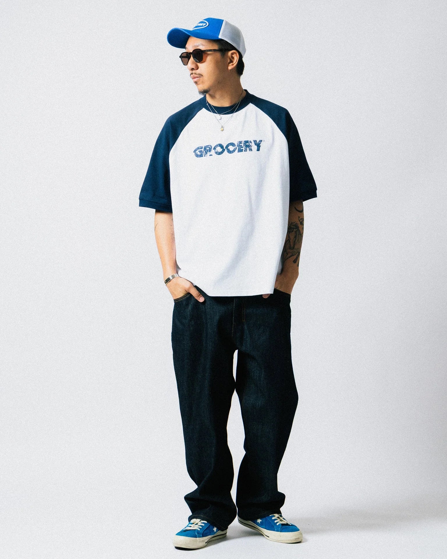A Eckhaus Latta Shirt pictured on a model in front of a white background. The title of the product is Eckhaus Latta Eclipse Turtleneck - Stone and the image was taken by 199A®.